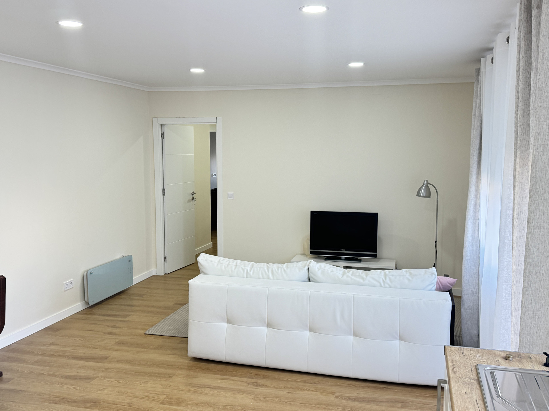 Living room with sofa and TV