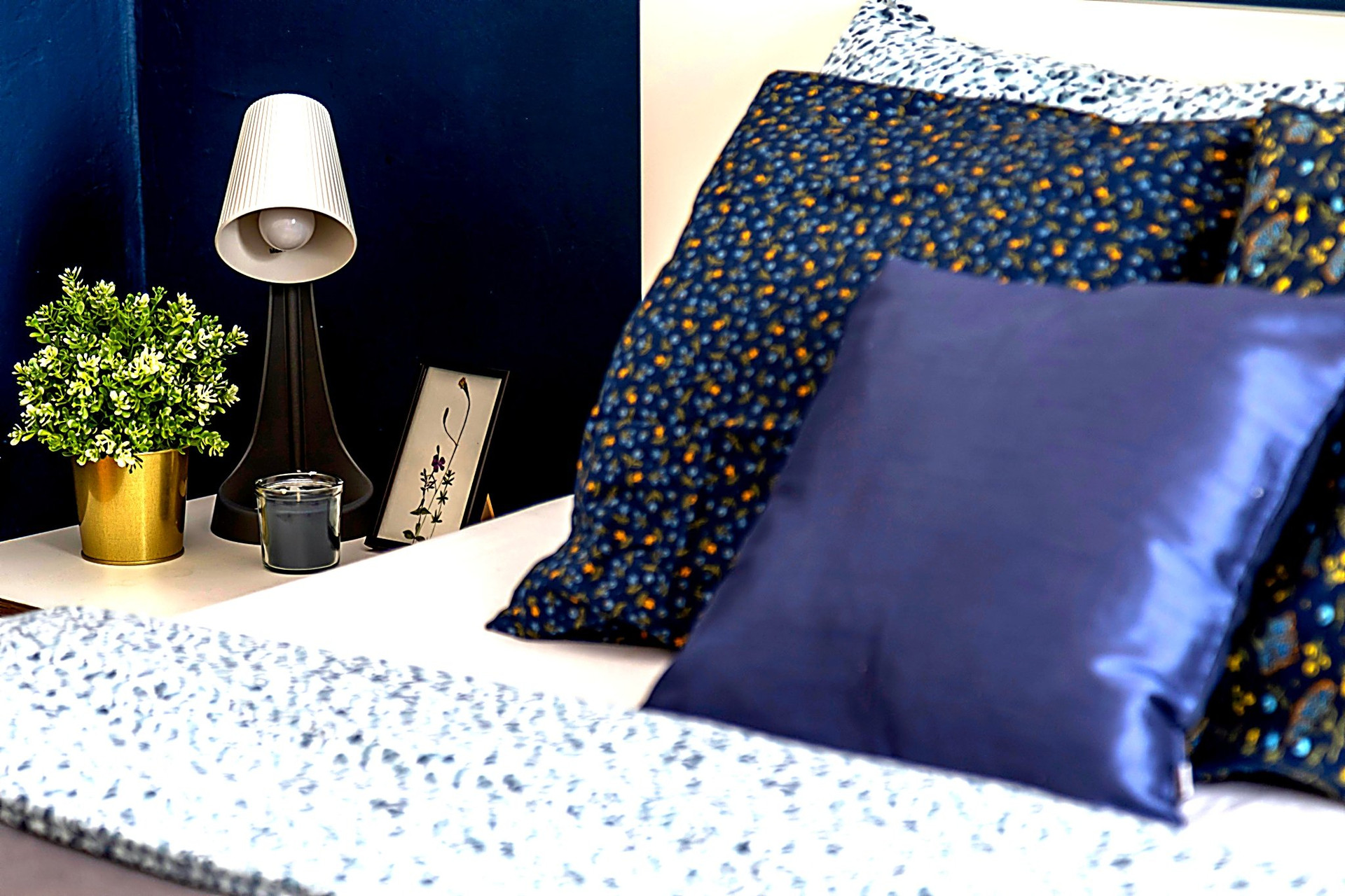 Cozy bedroom details that make the room feel warm, comfortable and ready to move into.