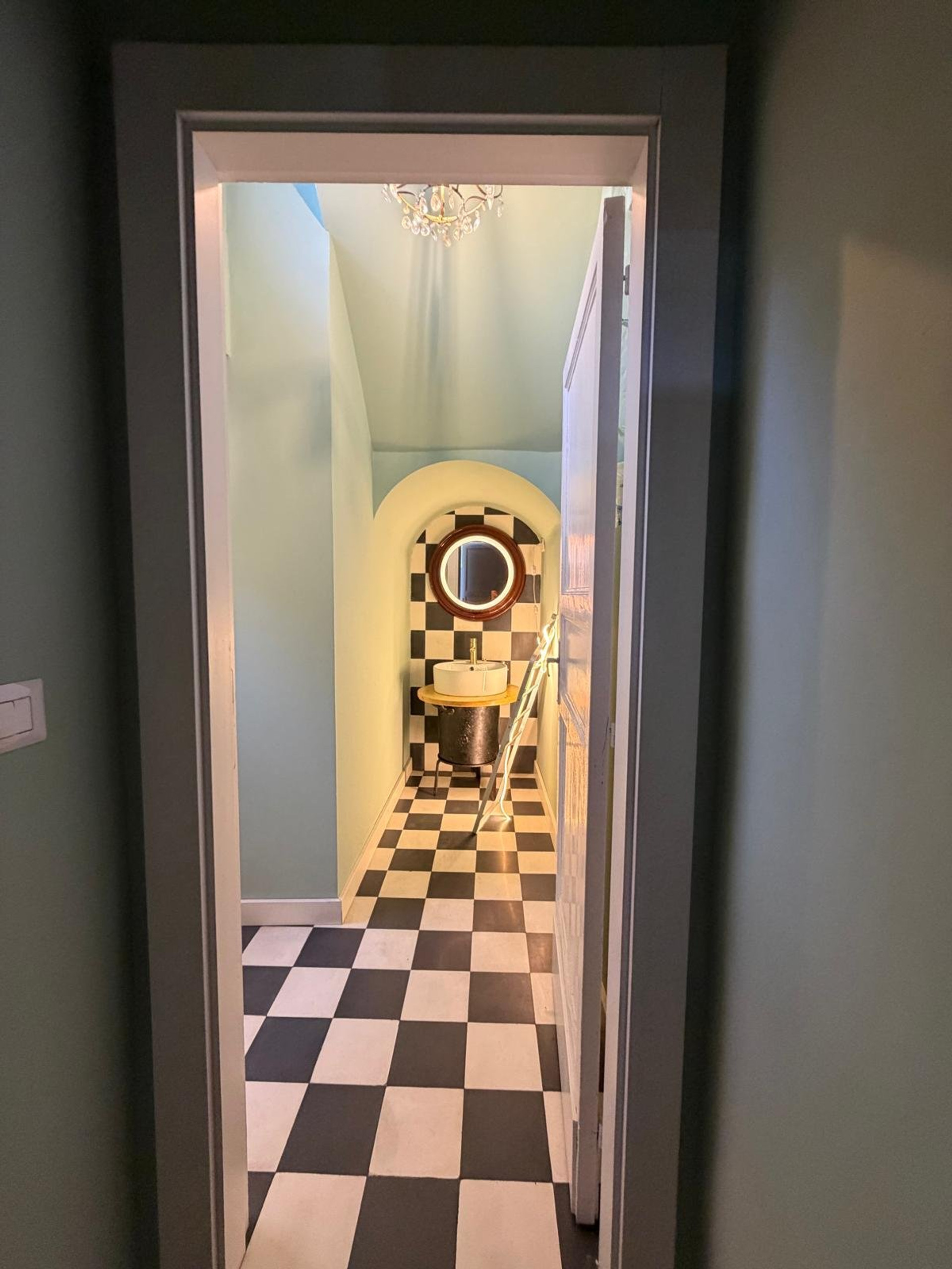 Checkered bathroom with vanity