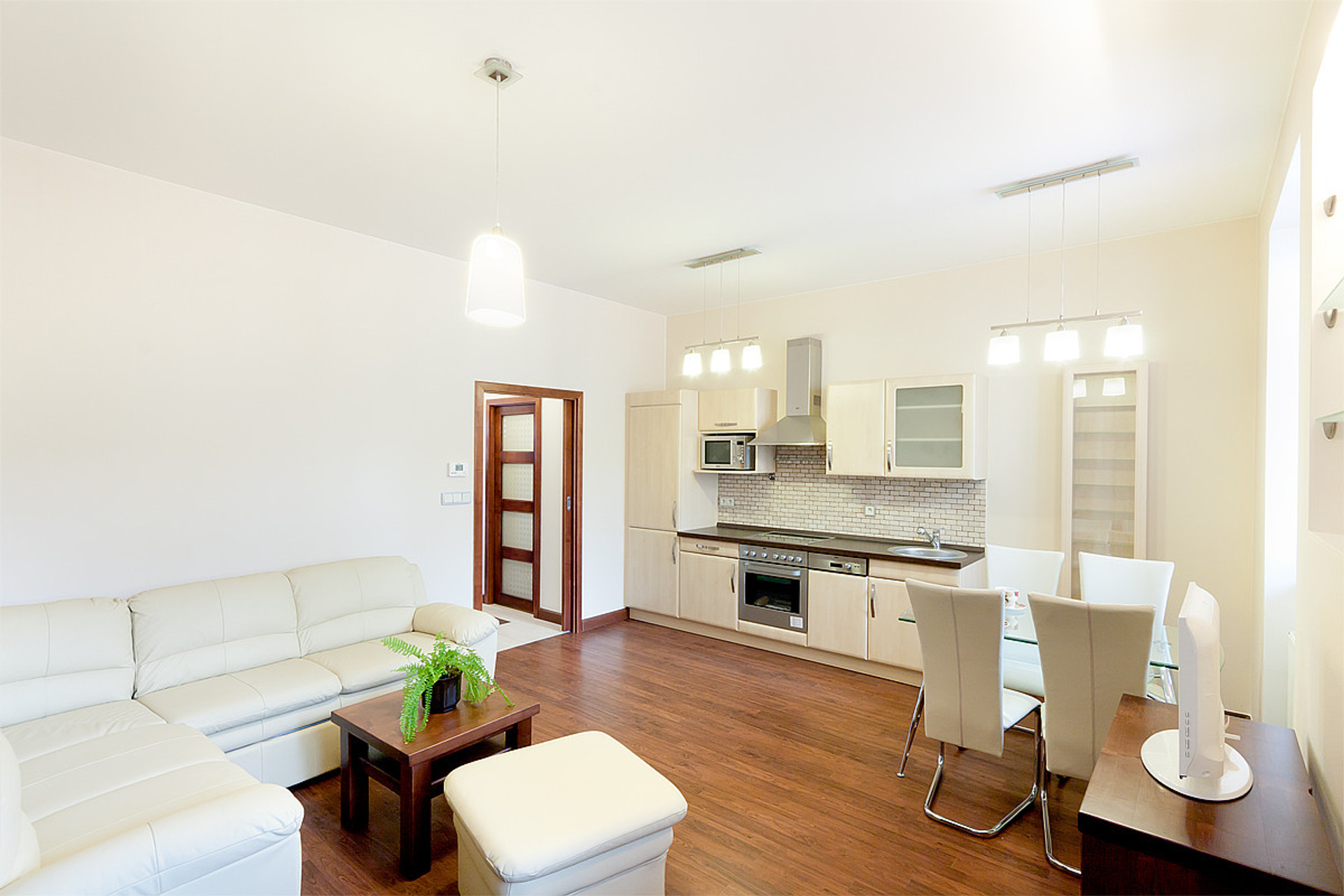 View to the kitchen with dishwasher, fridge. oven...