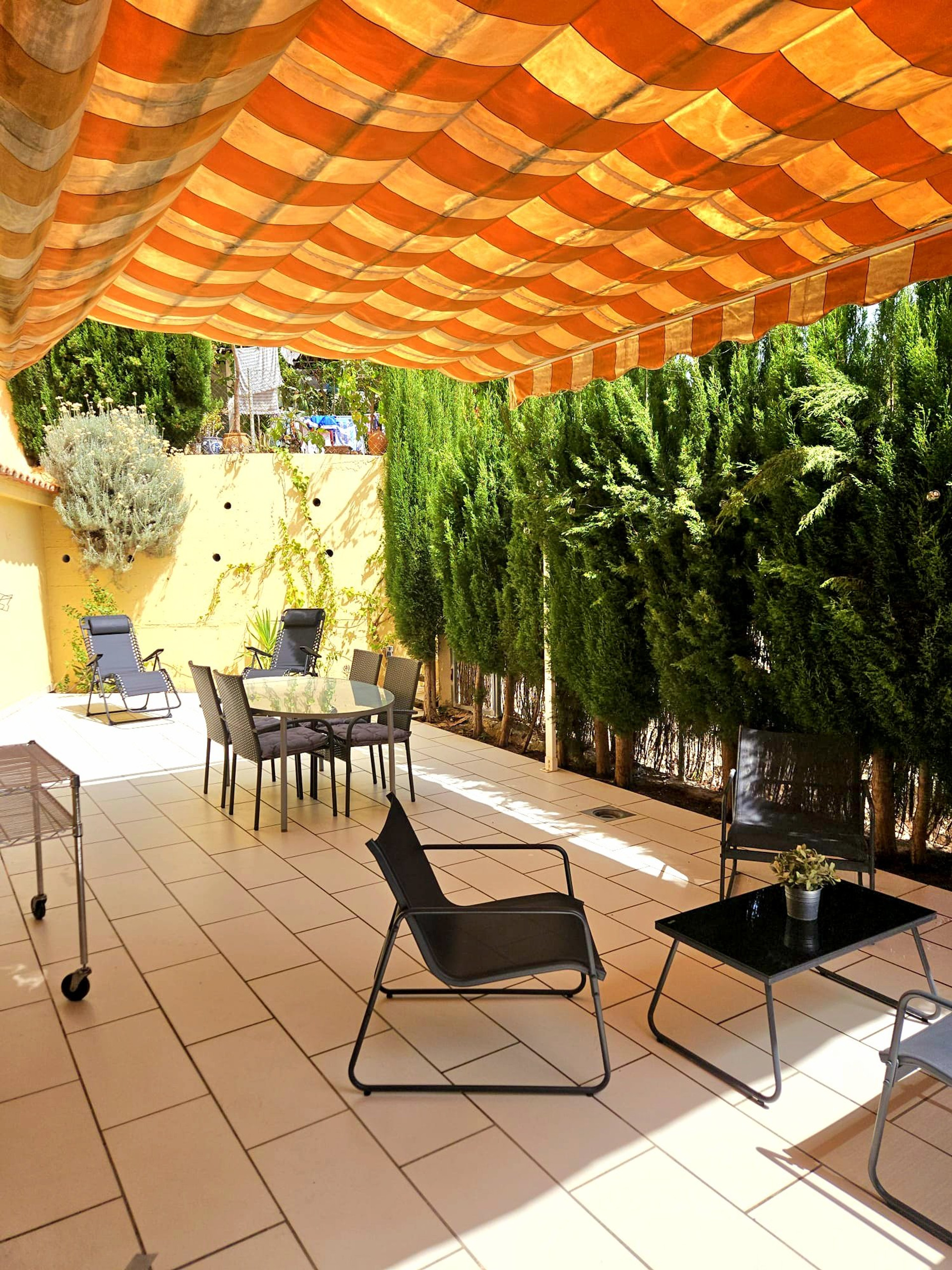Covered terrace with seating area
