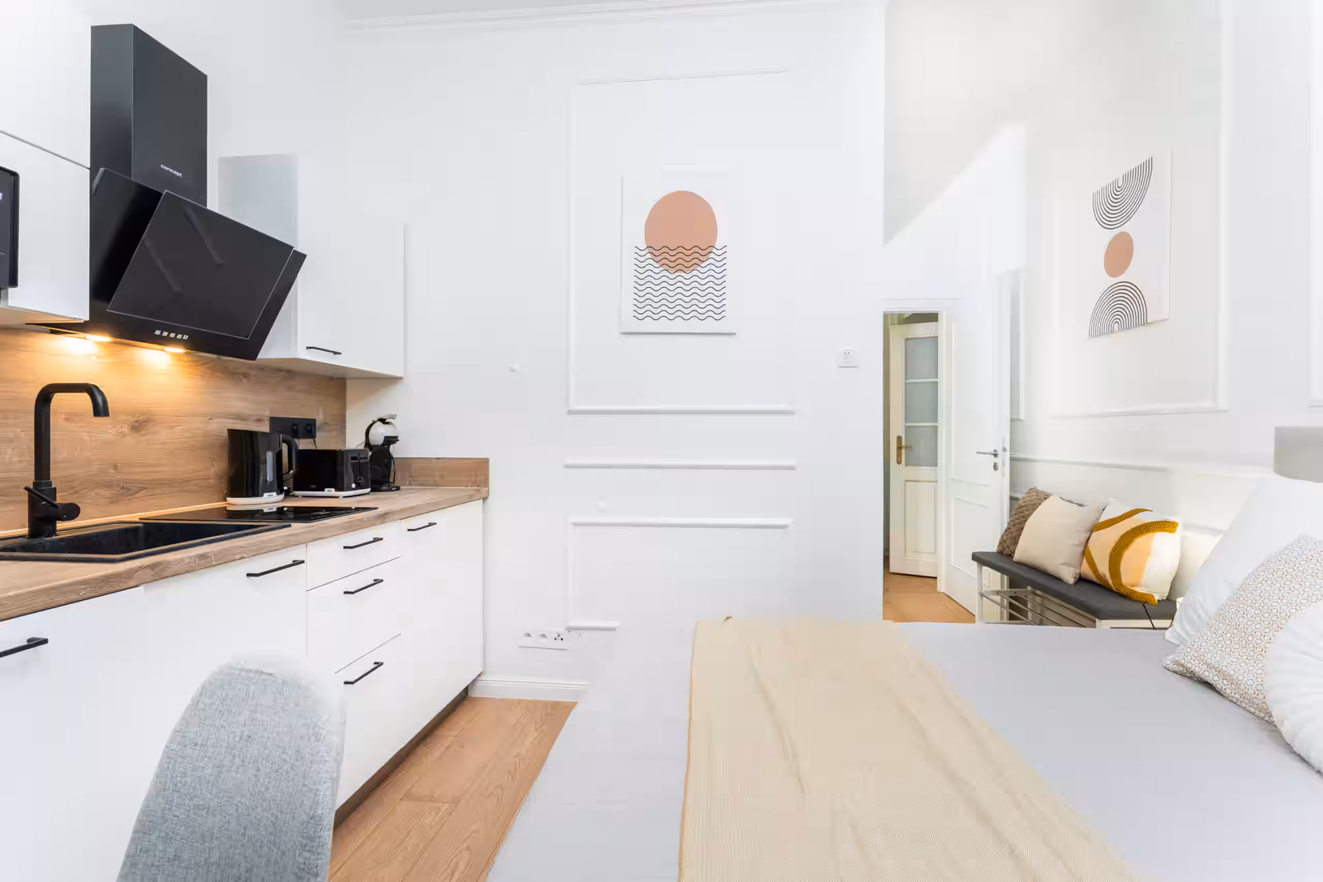 Studio kitchen and bed area