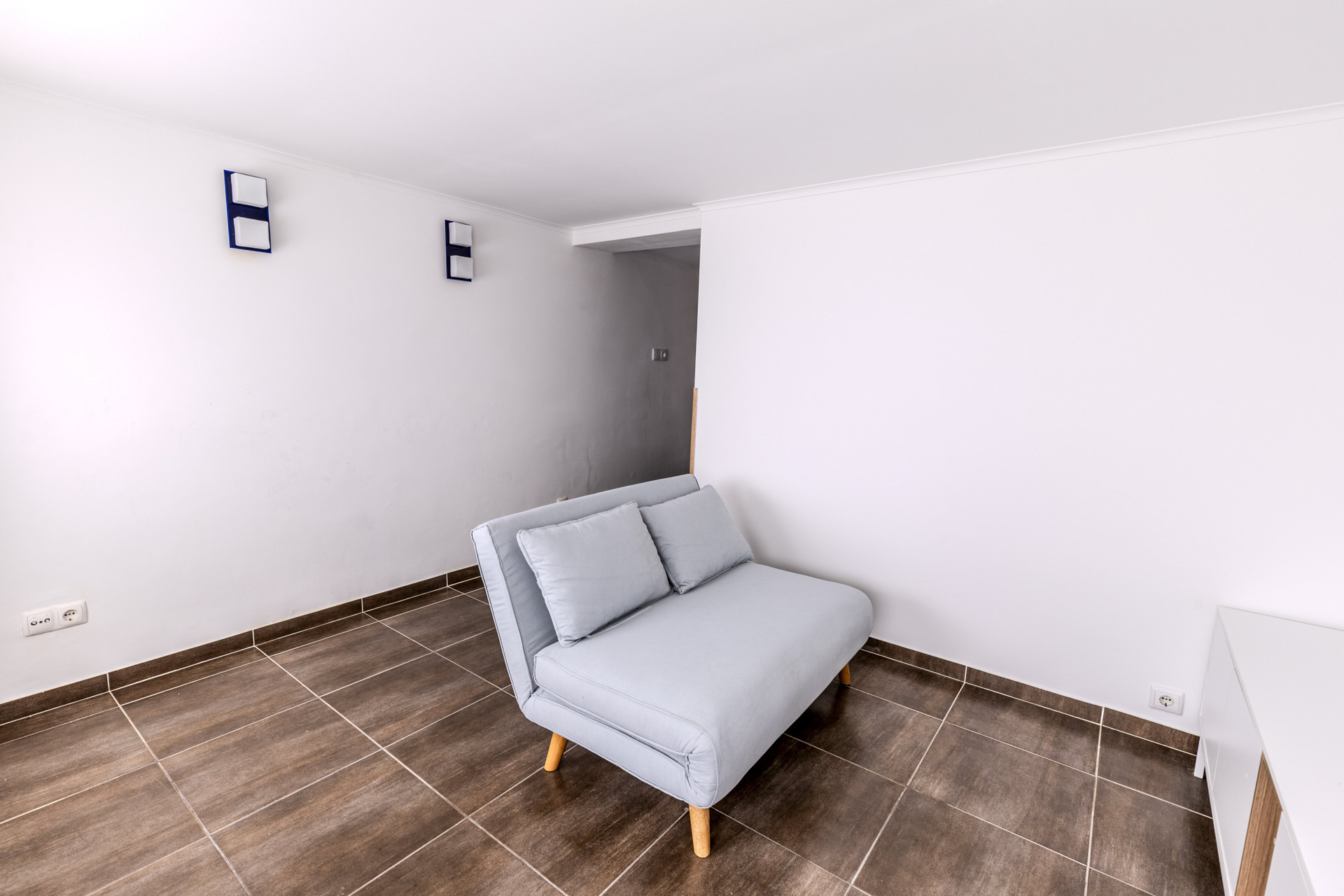 Bright room with lounge chair