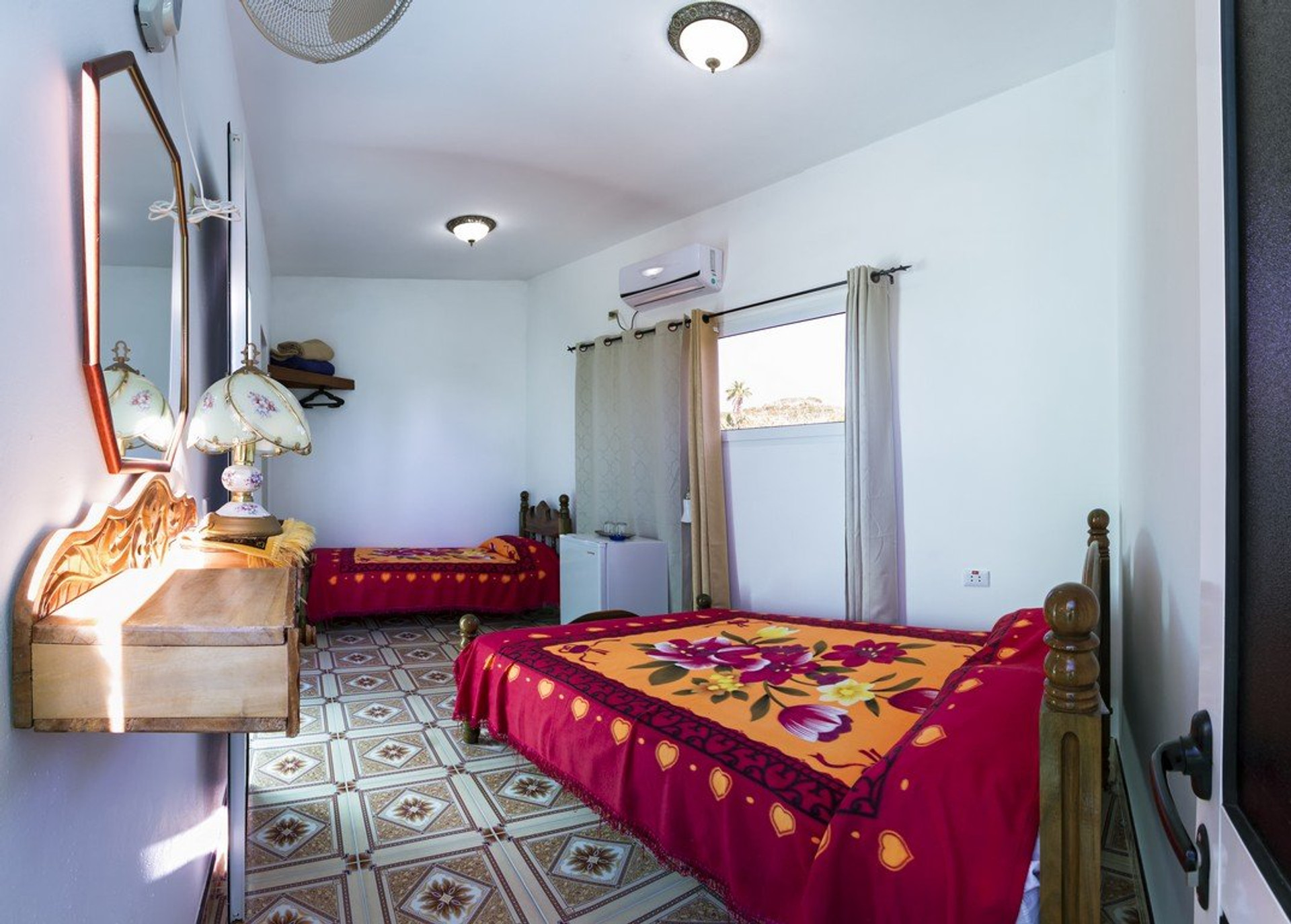 Twin bedroom with balcony access