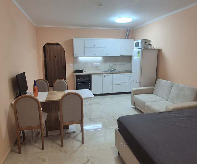 Light studio with balcony close to sea and center