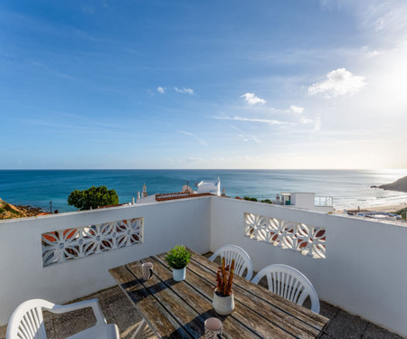 Comfy Flat W/ Rooftop Beach View by LovelyStay