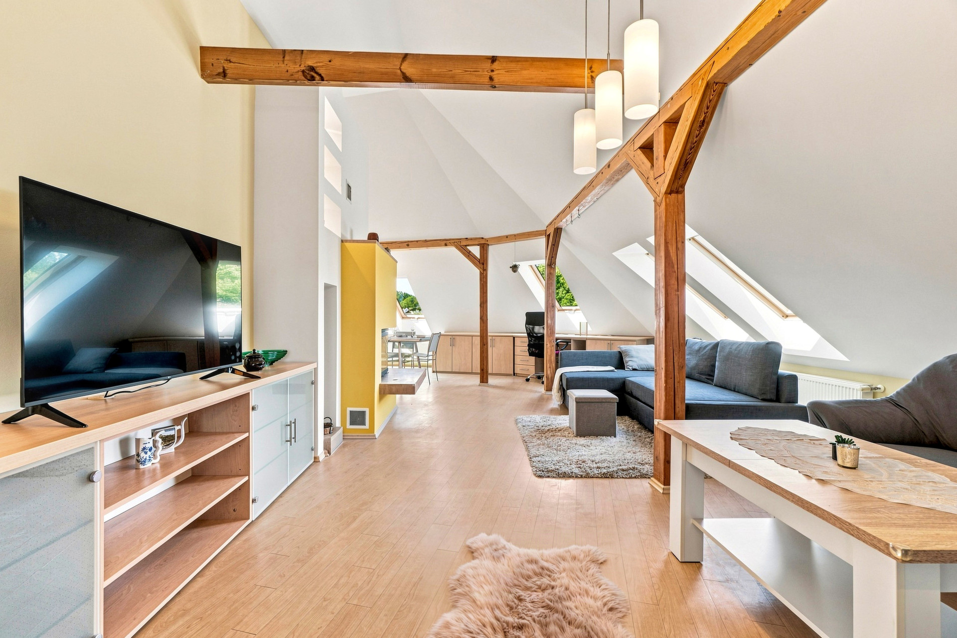 Open living room with high ceiling