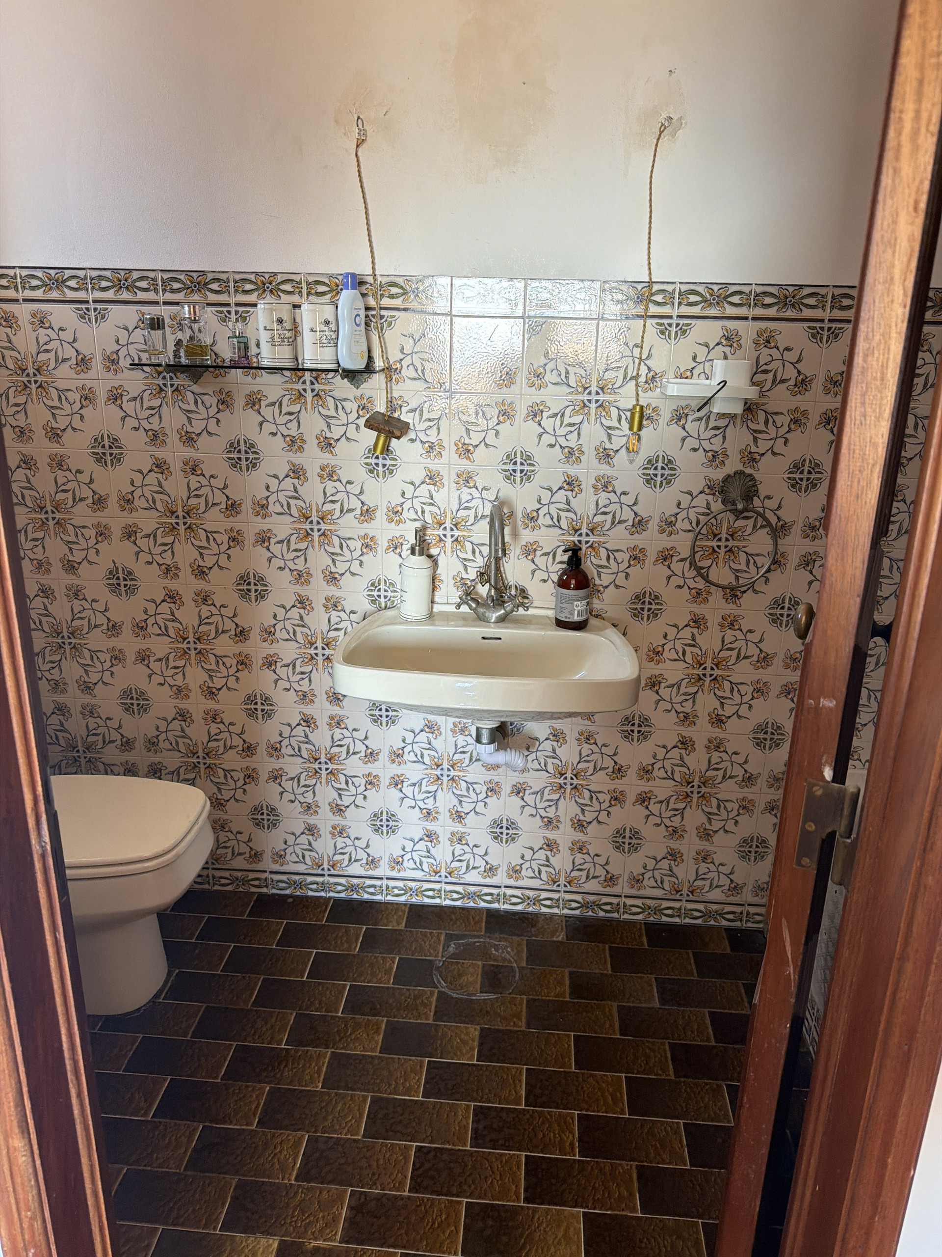 Bathroom sink and toilet area
