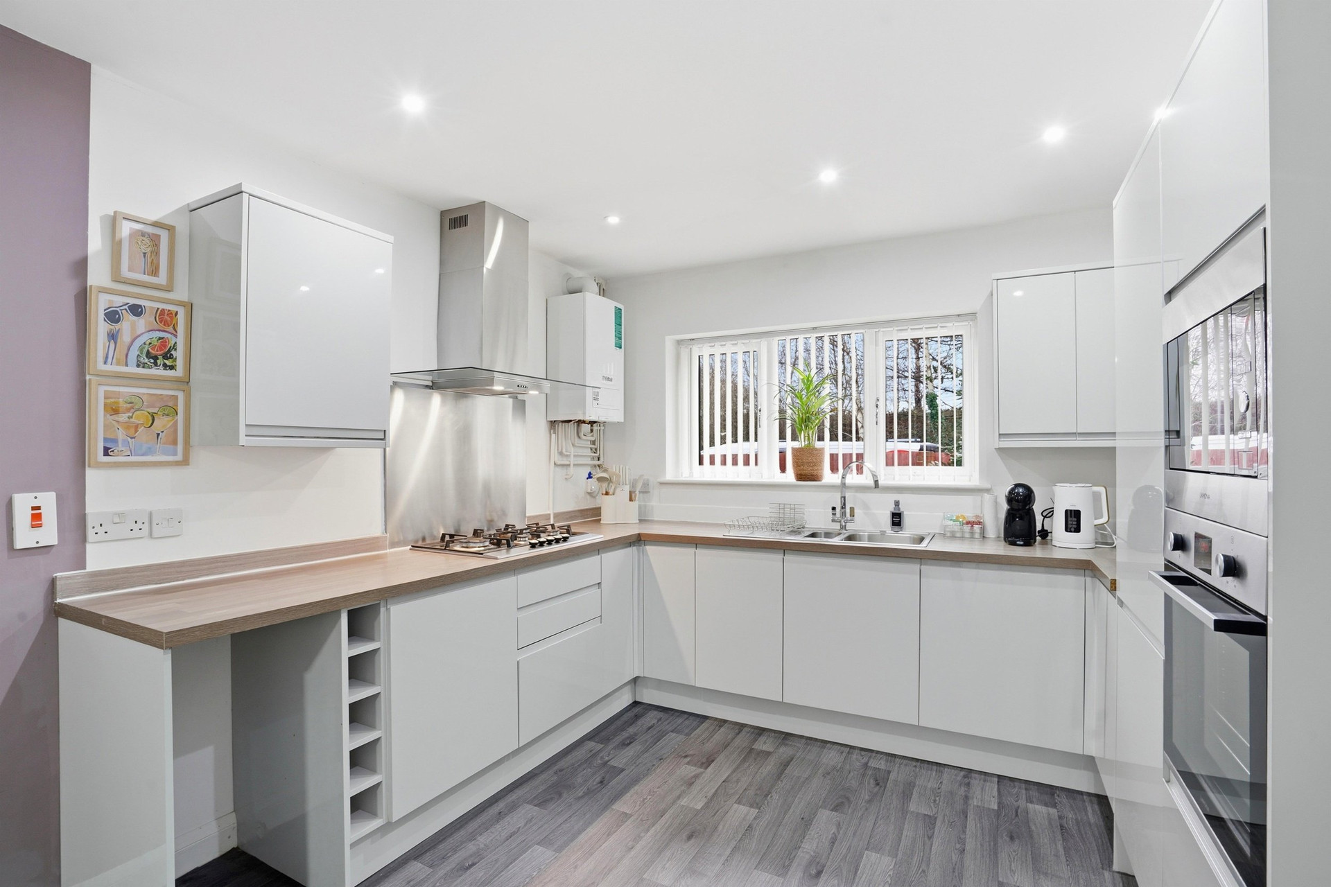Modern white kitchen with appliances