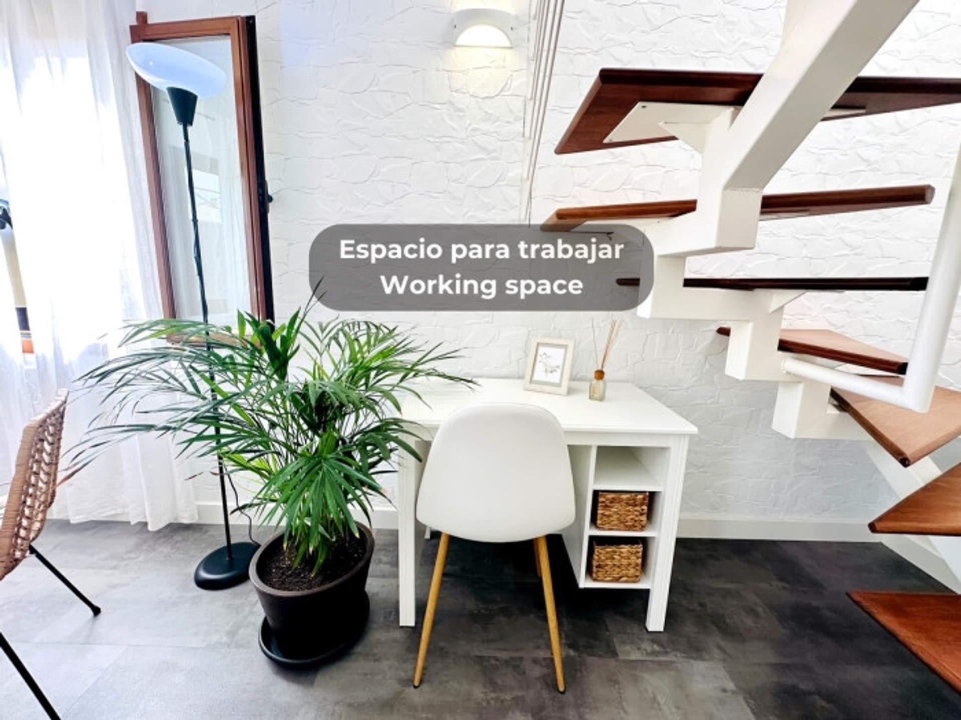 Working desk beside staircase