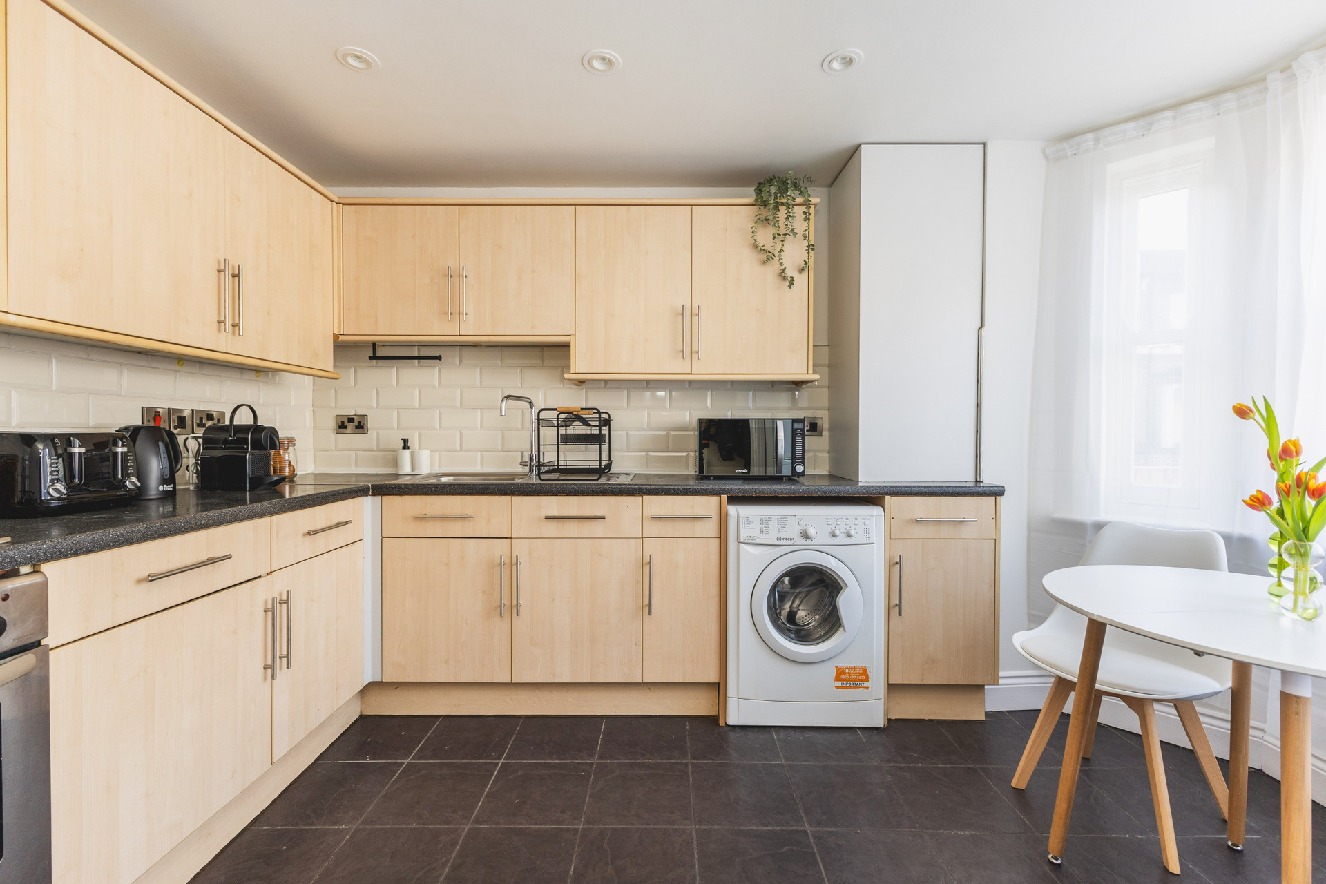 Kitchen with washing machine table
