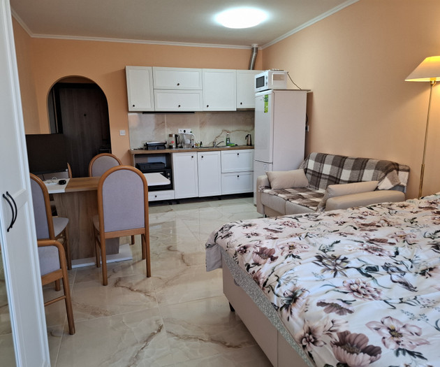 Light studio with balcony close to sea and center