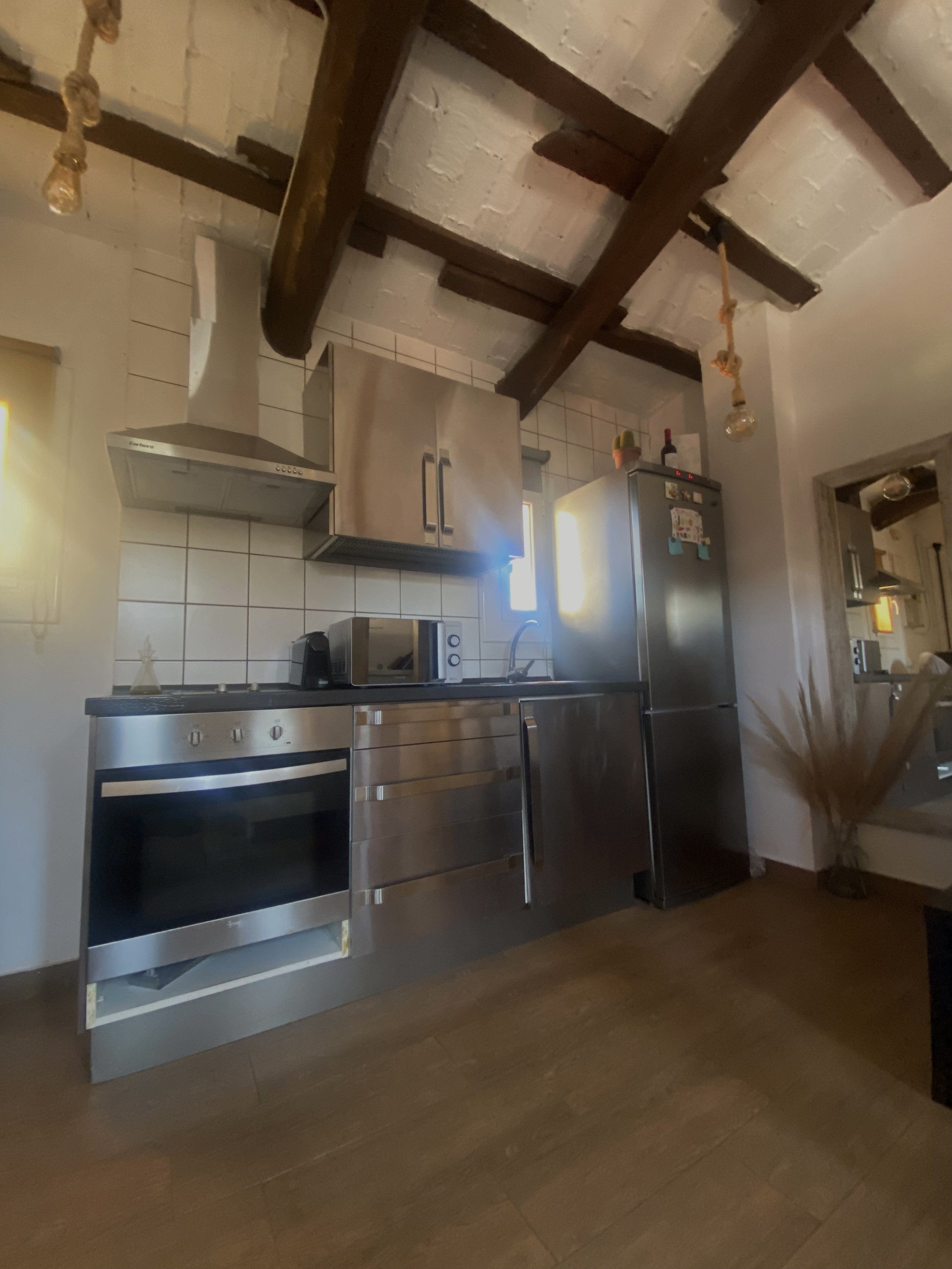 Kitchen with oven and fridge
