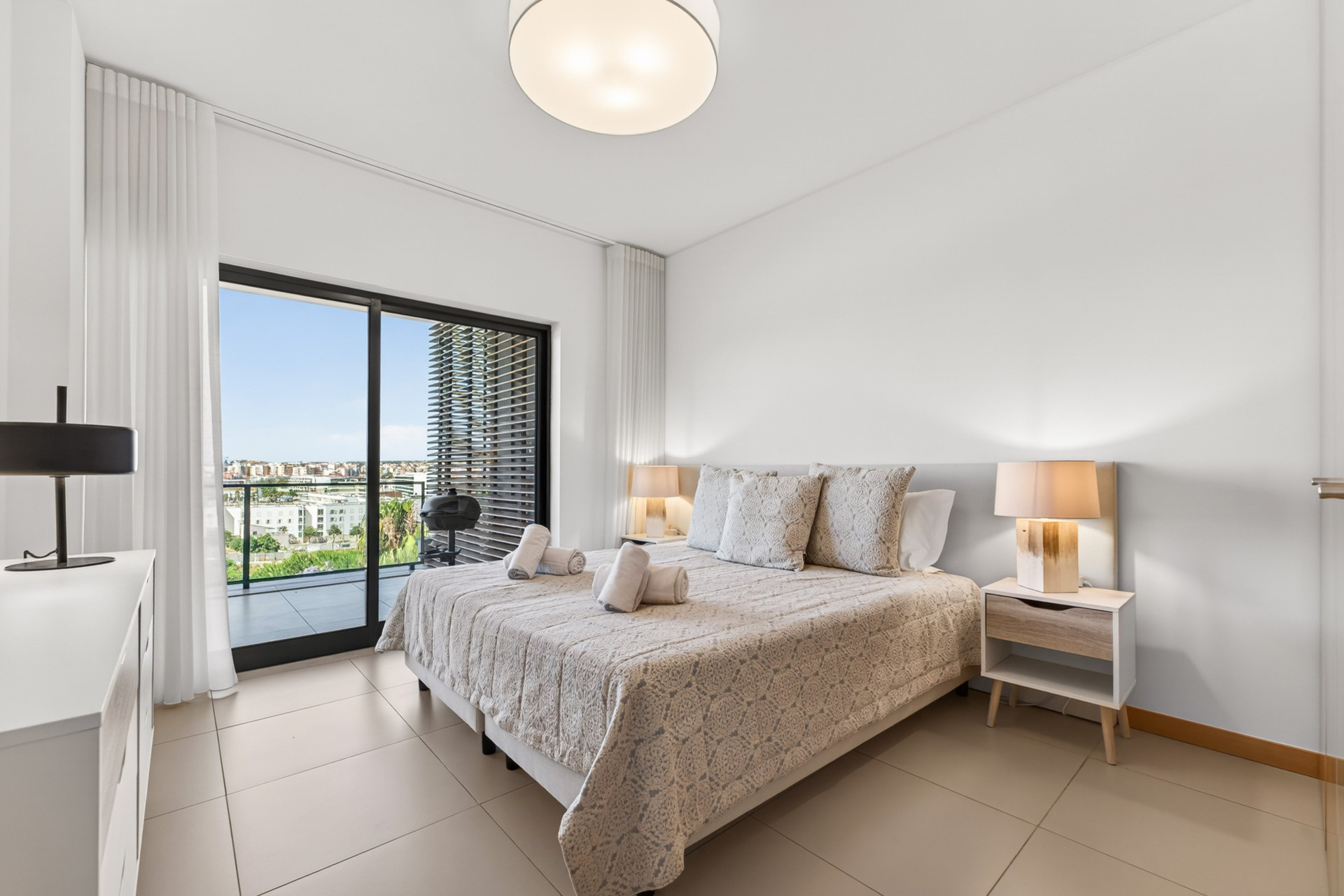 Master bedroom with balcony view