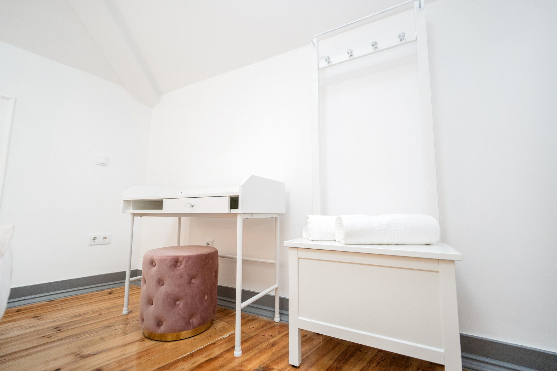 Corner desk with stool and rack