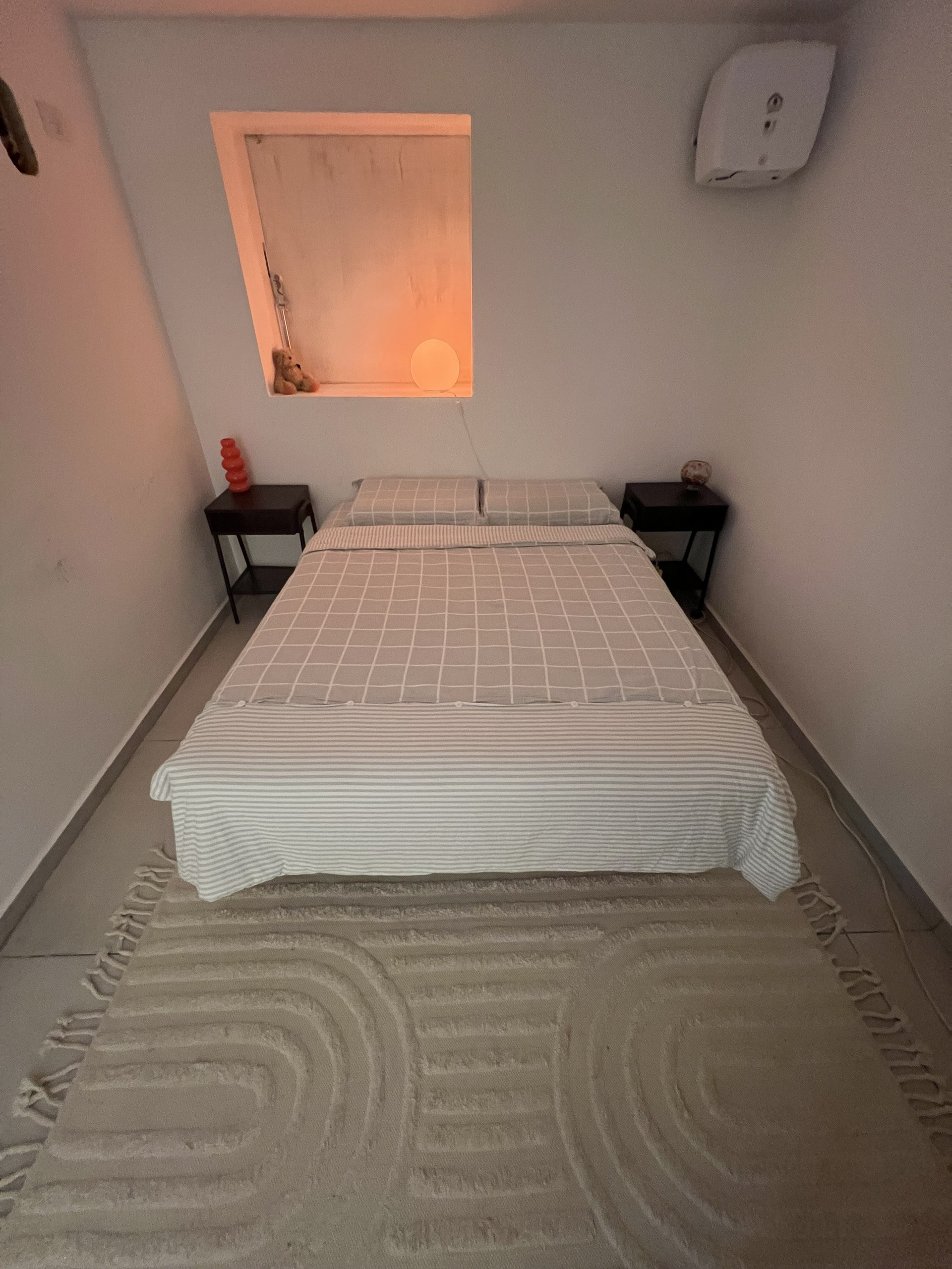 Cozy bedroom with double bed
