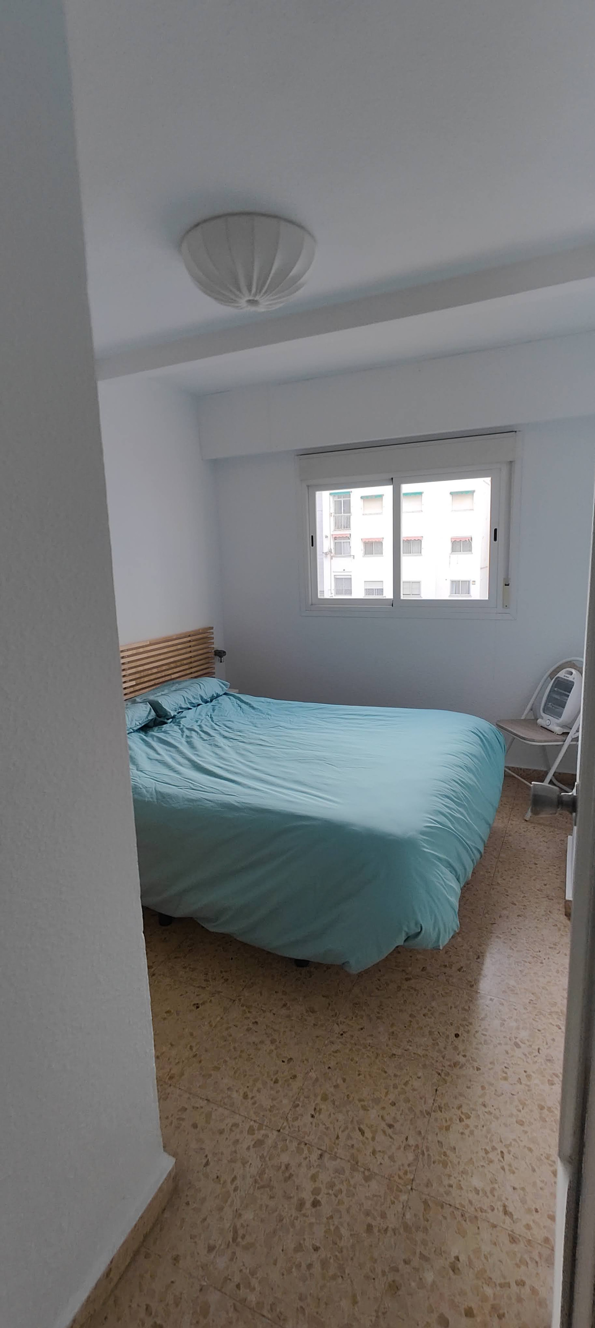 Bedroom with double bed window