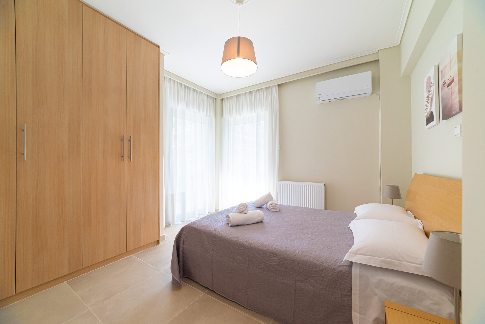 Bedroom with wardrobe and bed