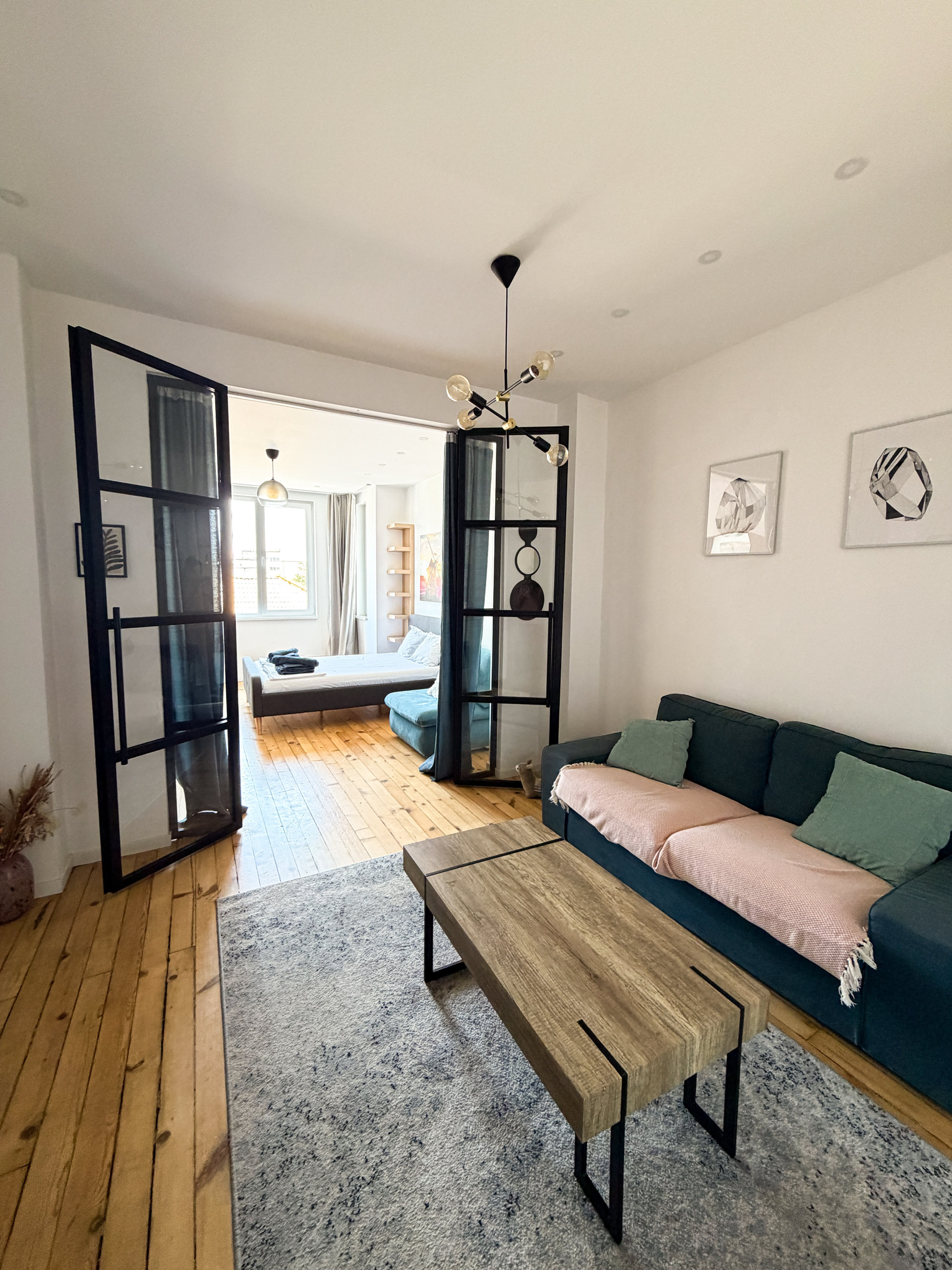 Bright living room open to bedroom