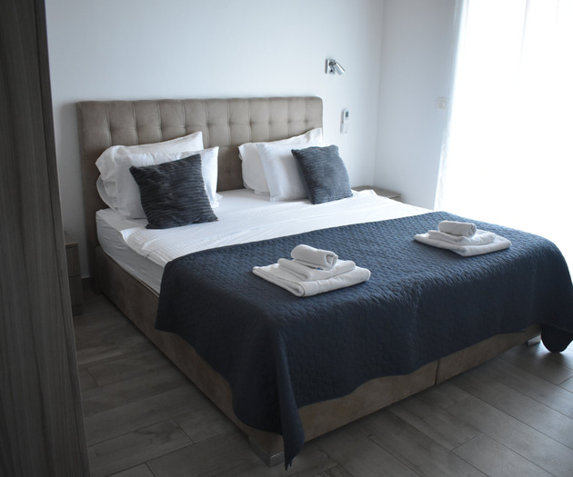 Bright bedroom with balcony access