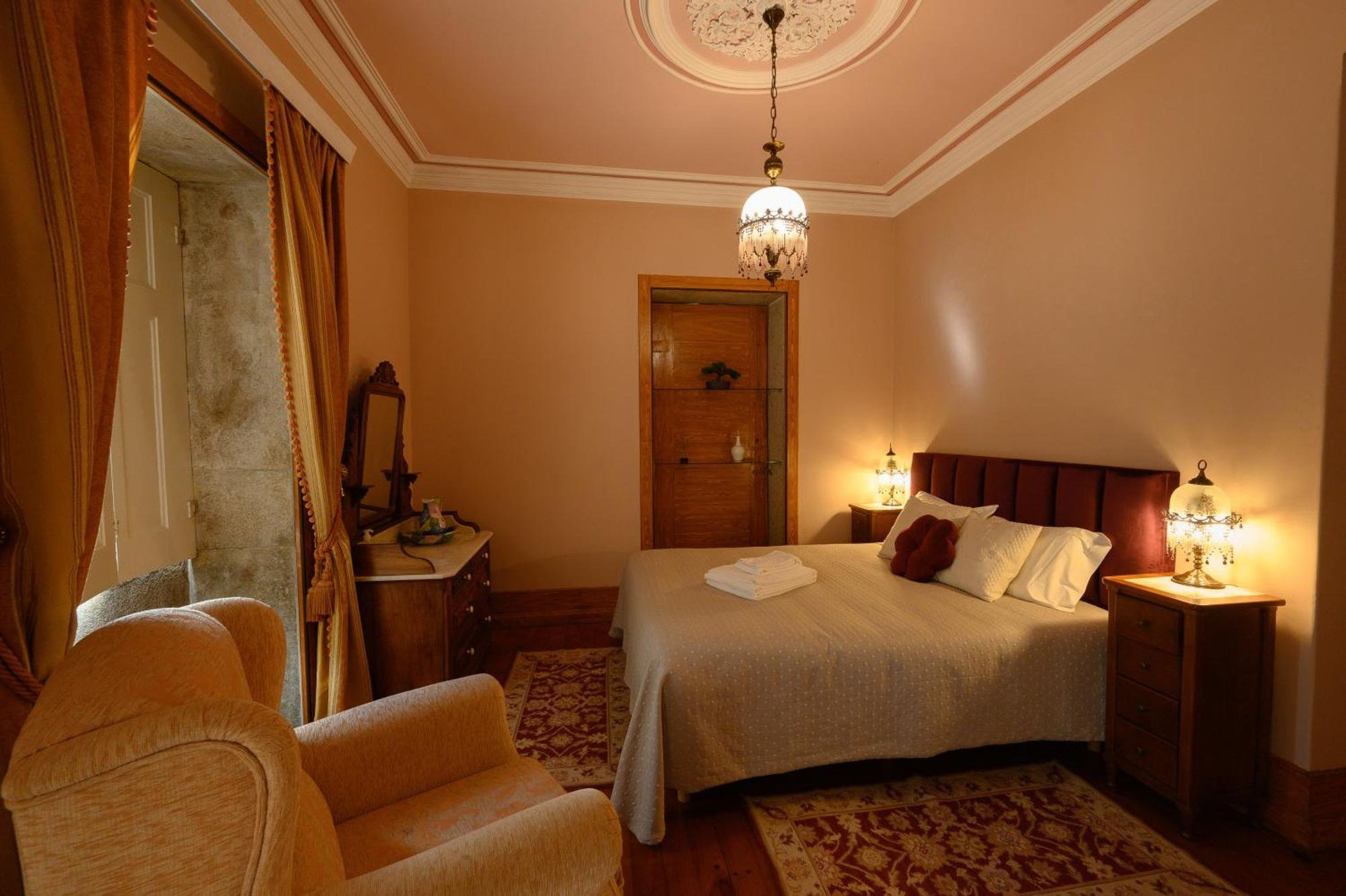 Cozy bedroom with armchair