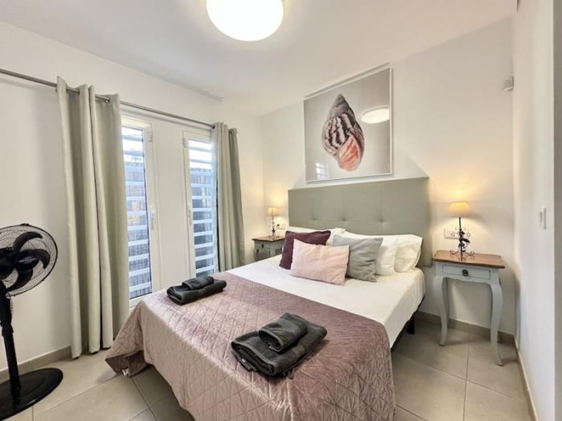 Bedroom with window and nightstands