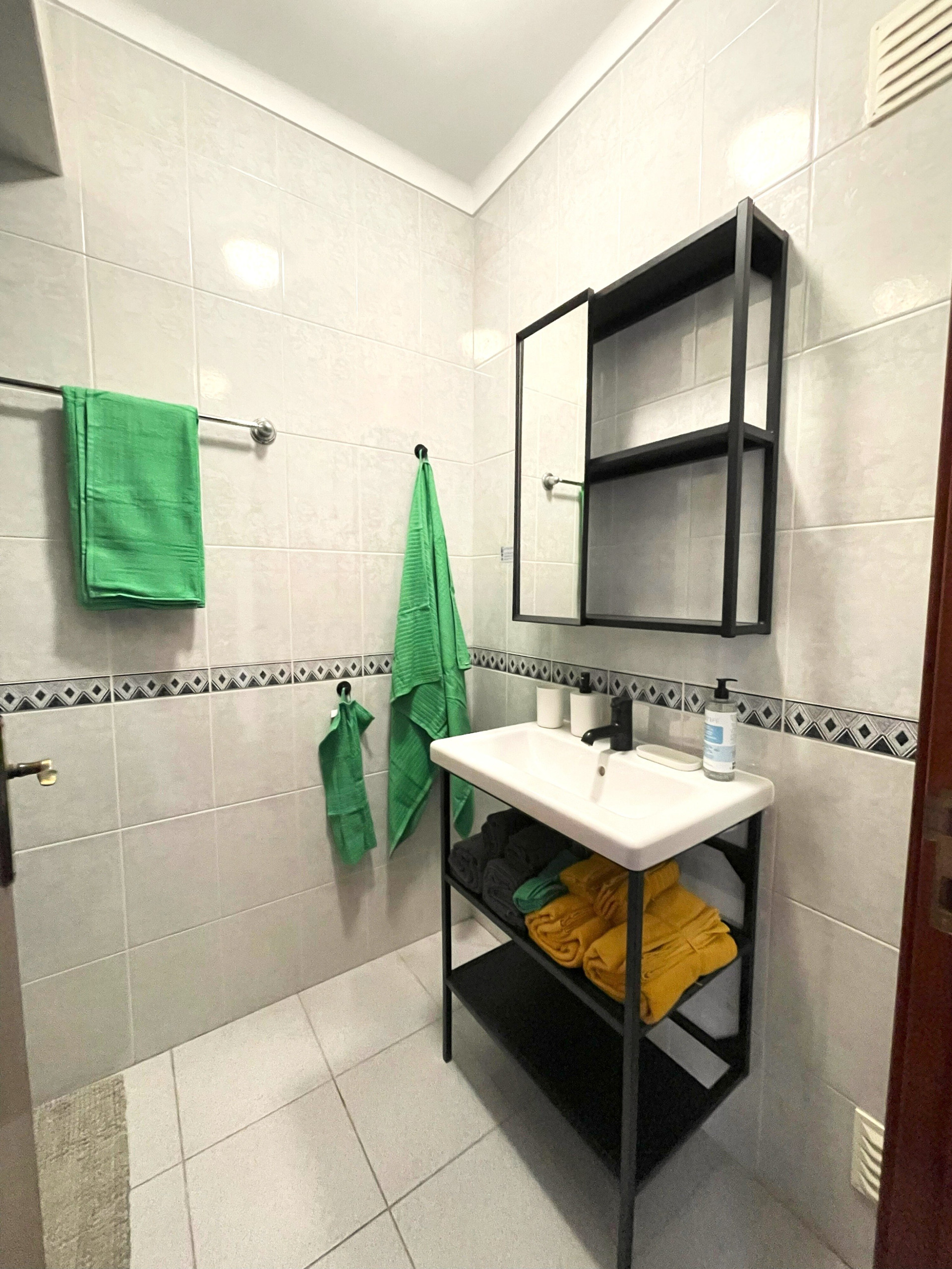 Bathroom sink with towels