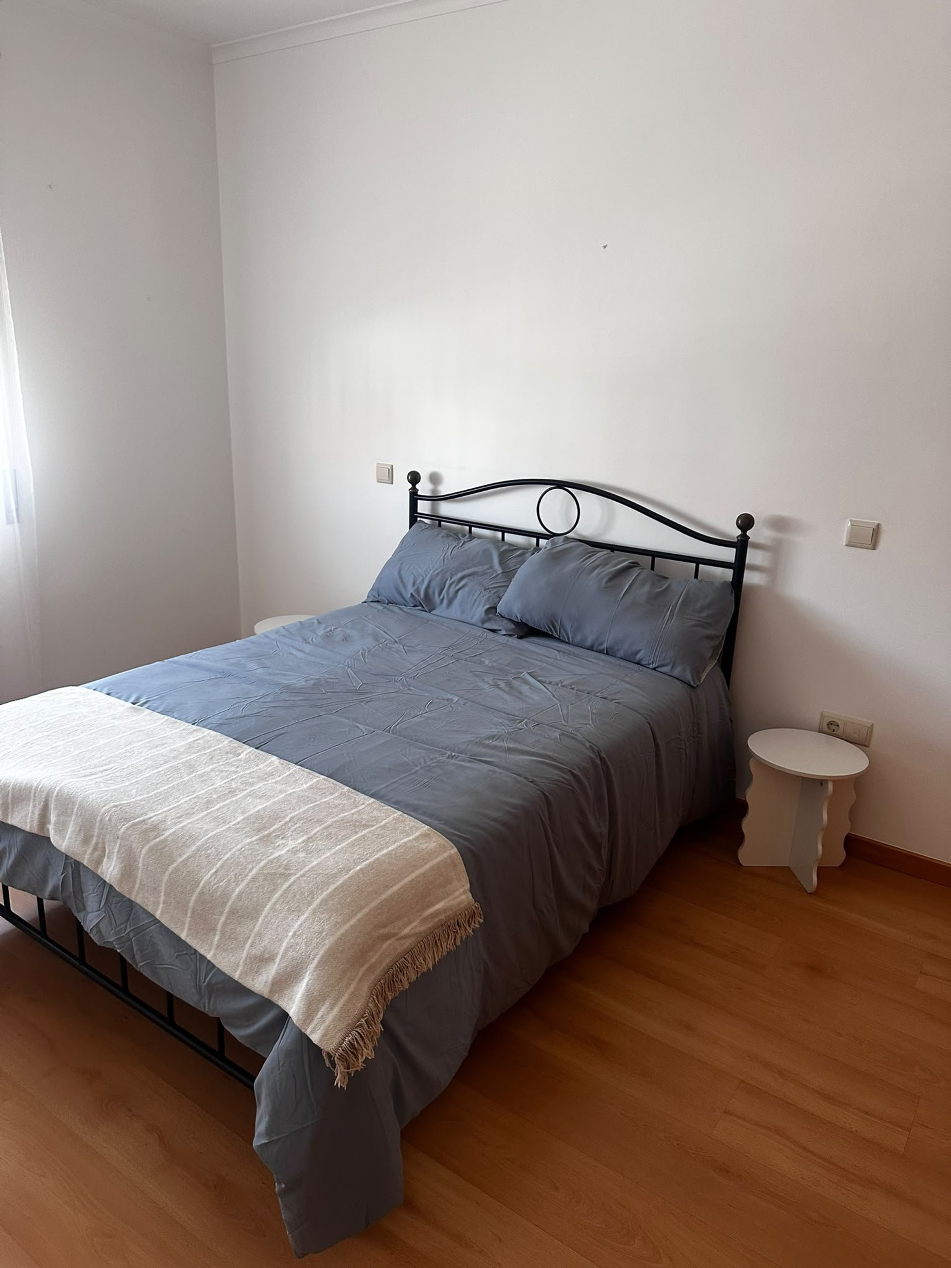 Bedroom with blue bedding