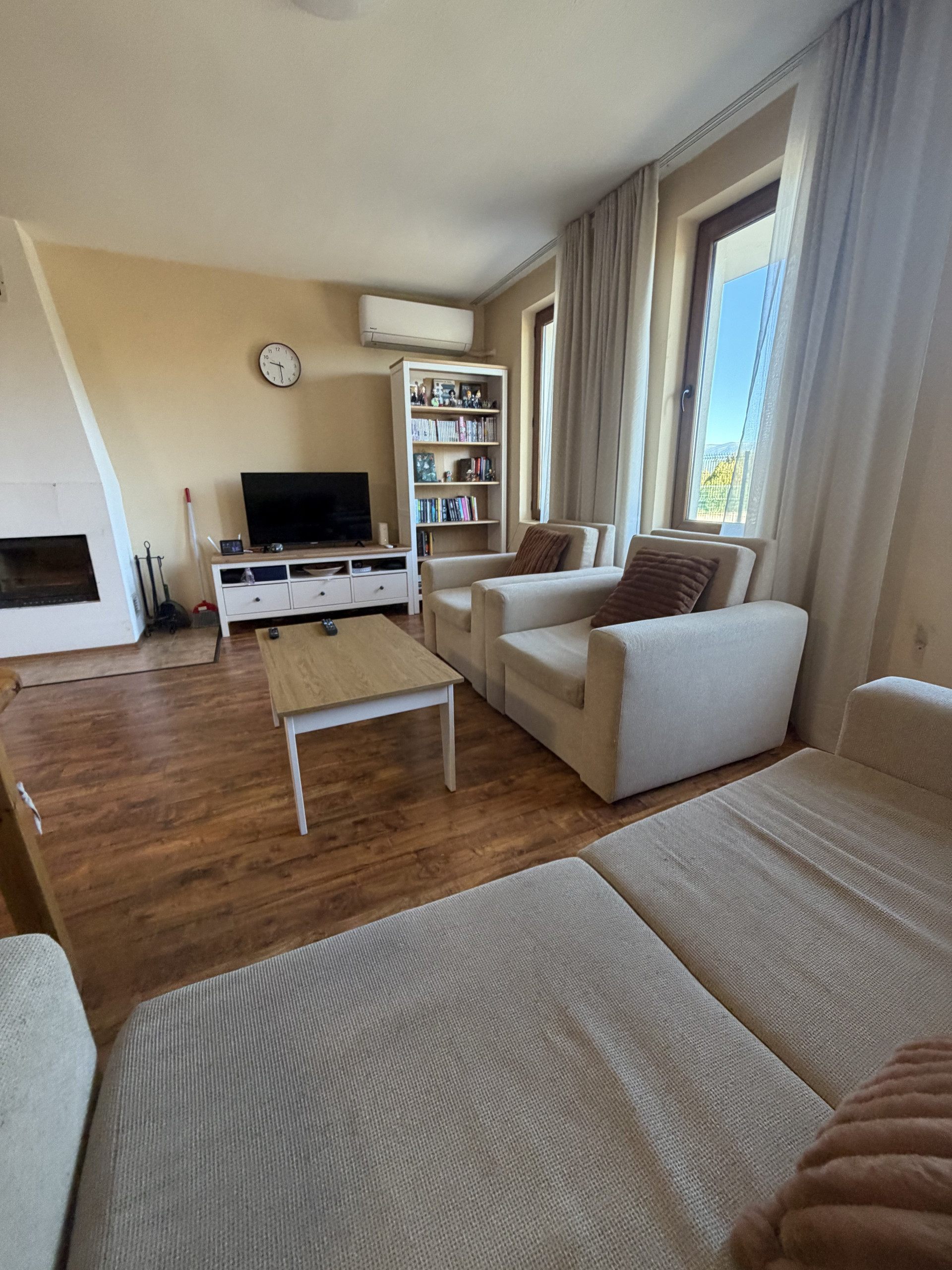 Living room with fireplace and sofa