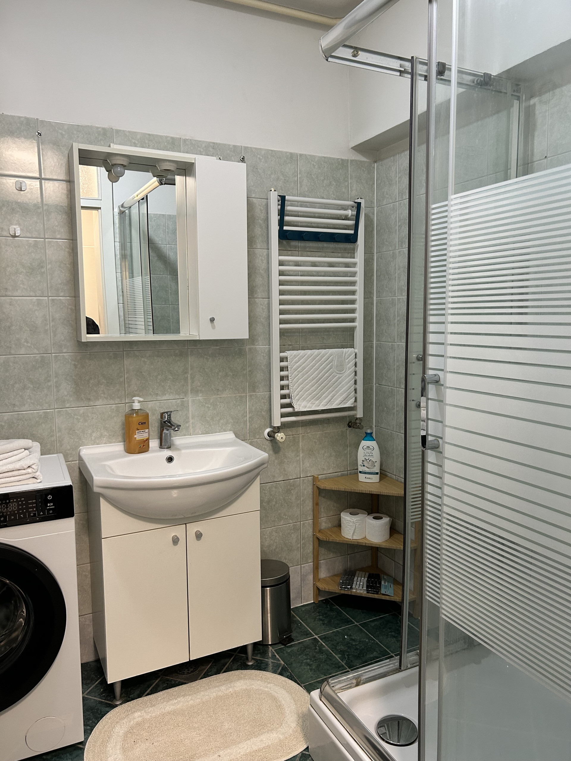 Bathroom with shower and vanity