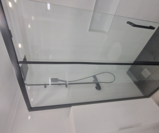 Glass shower enclosure close-up