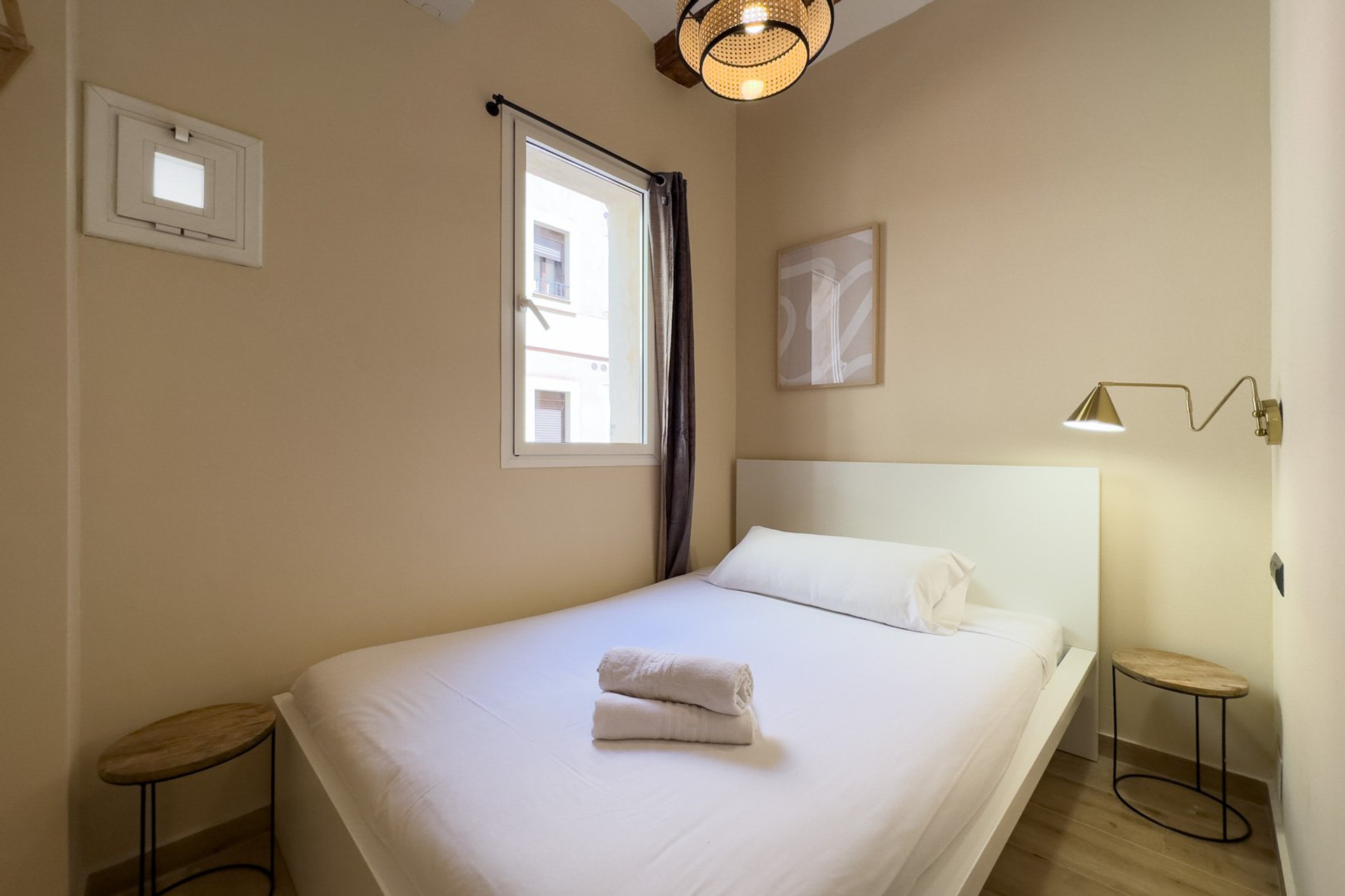 Cozy double bedroom with pendant light