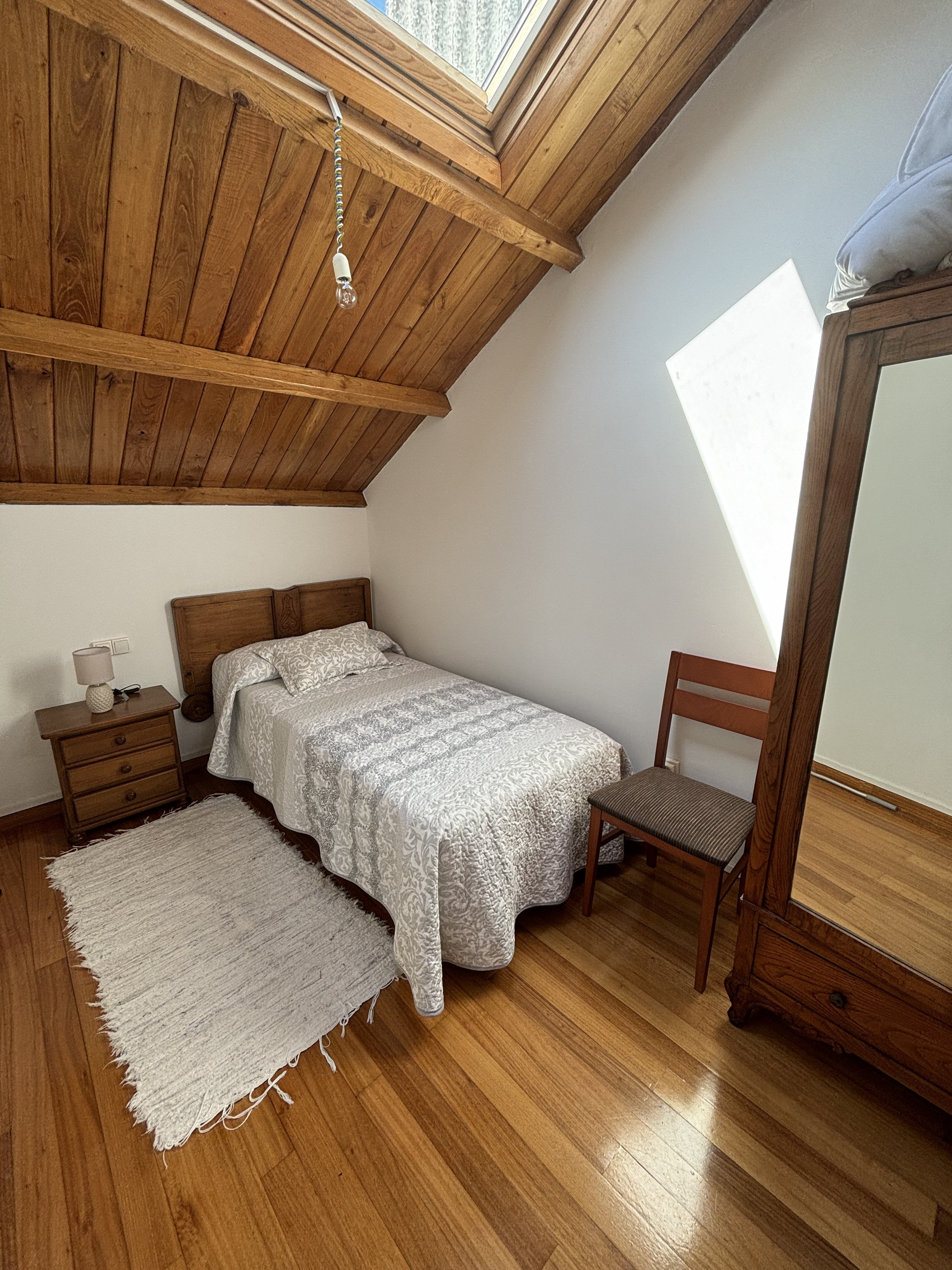 Attic bedroom with wardrobe