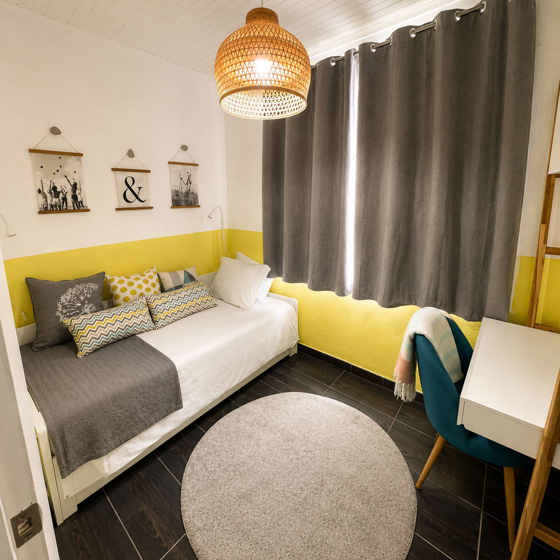 Single bedroom with yellow accents