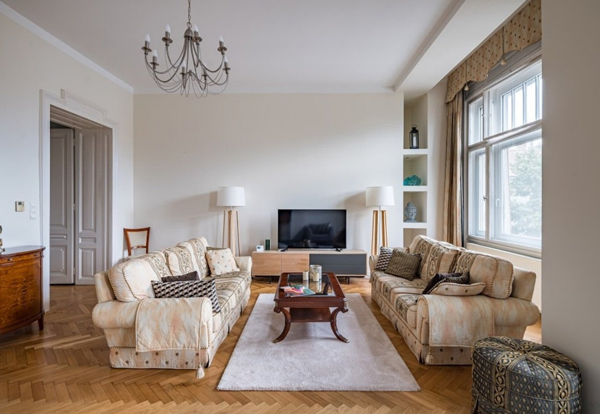 Spacious living room with TV sofas