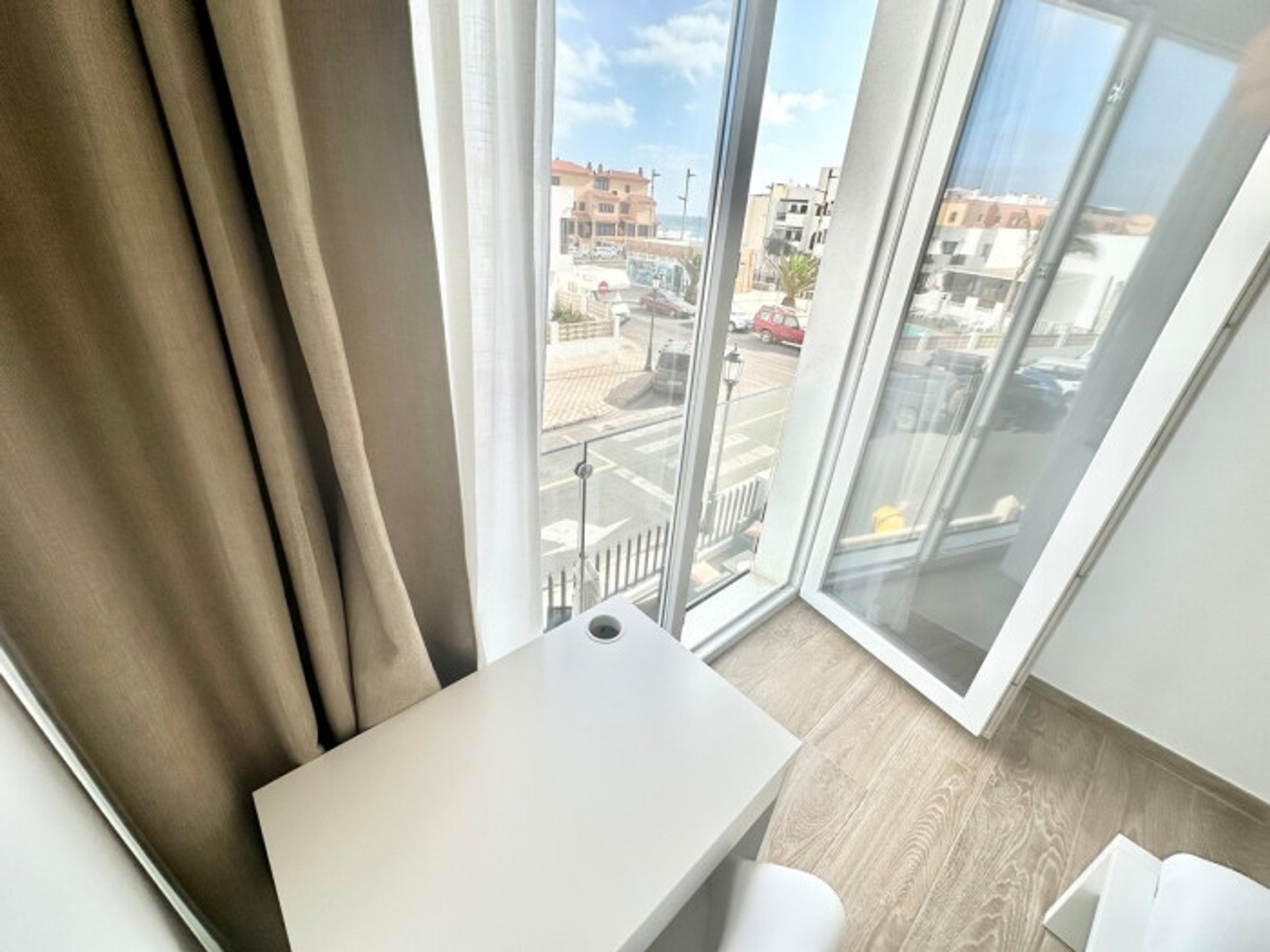 Bedroom desk with street view window