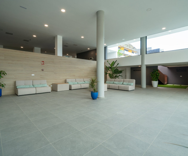 Lobby with sofas and stairs