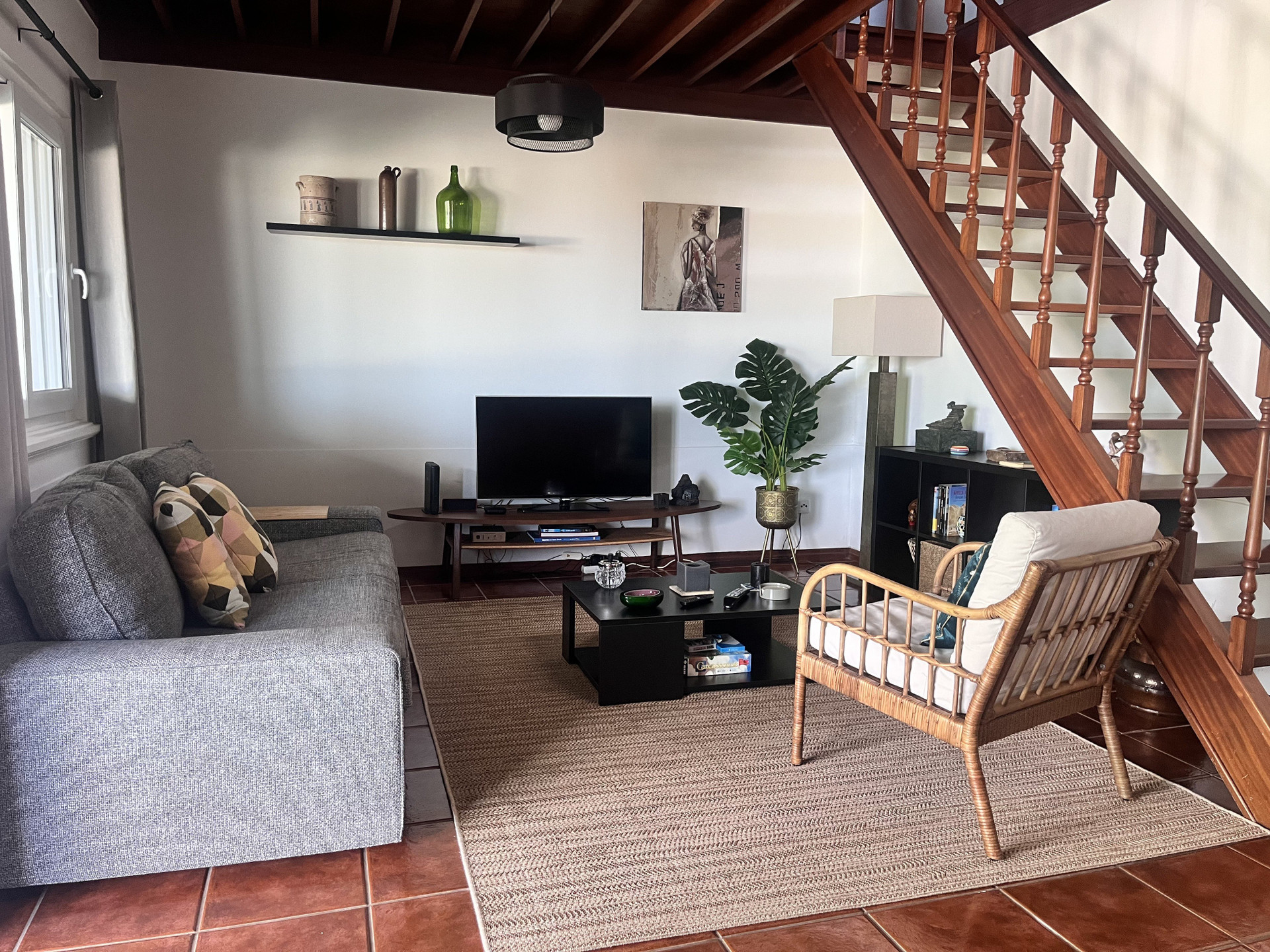 Living room with sofa and stairs