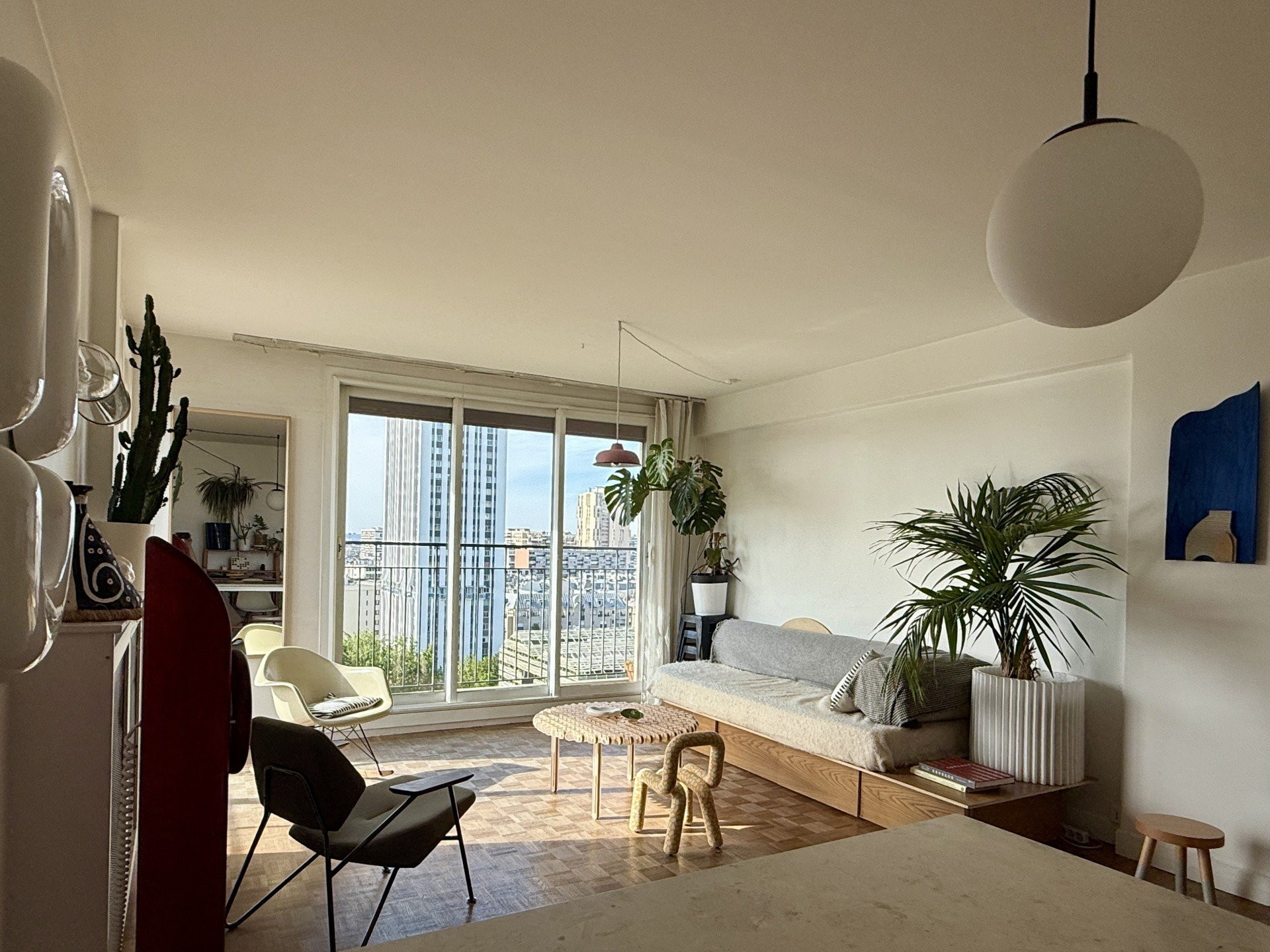 Bright living room with canal views