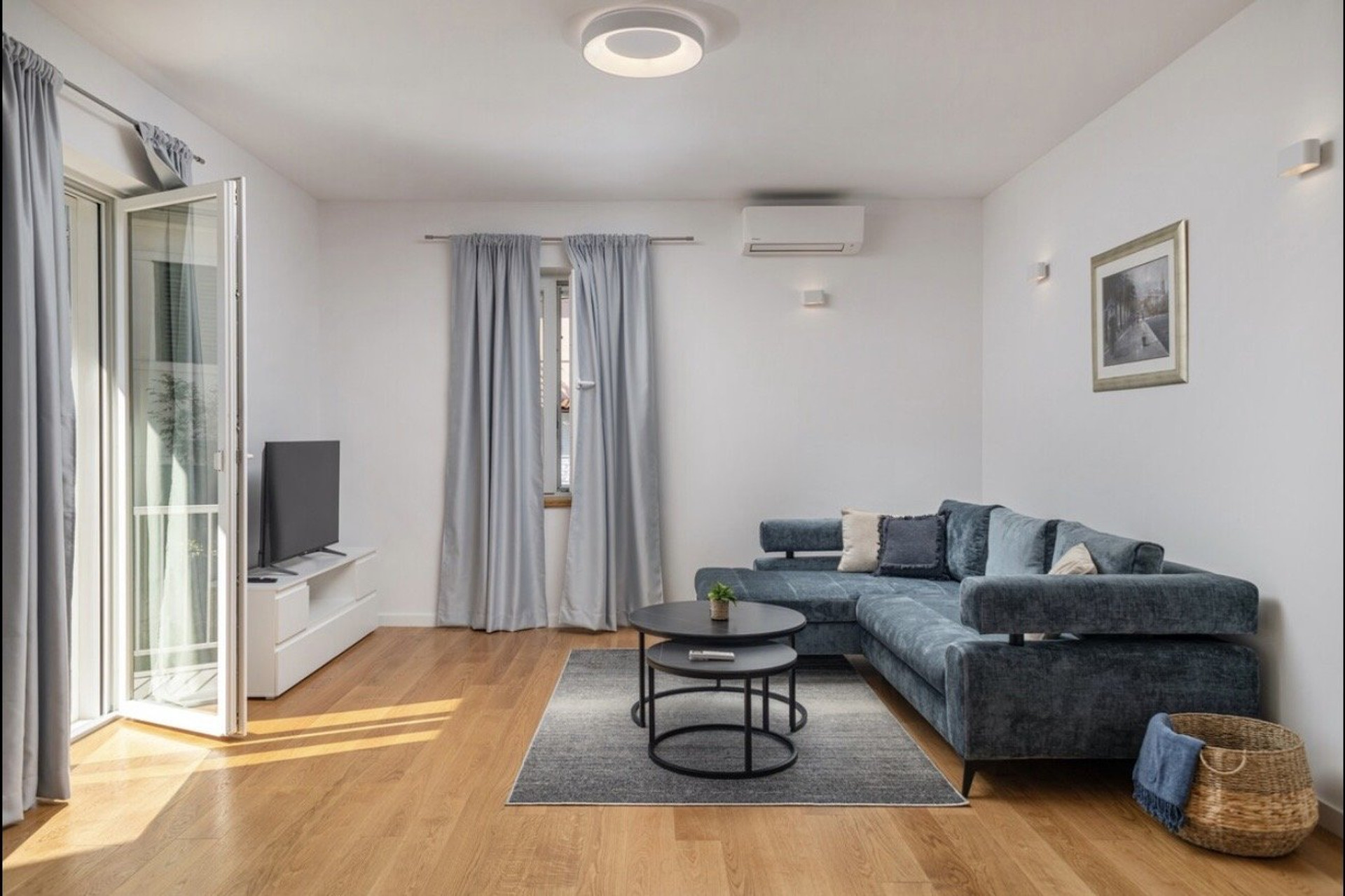 Living room with blue sofa