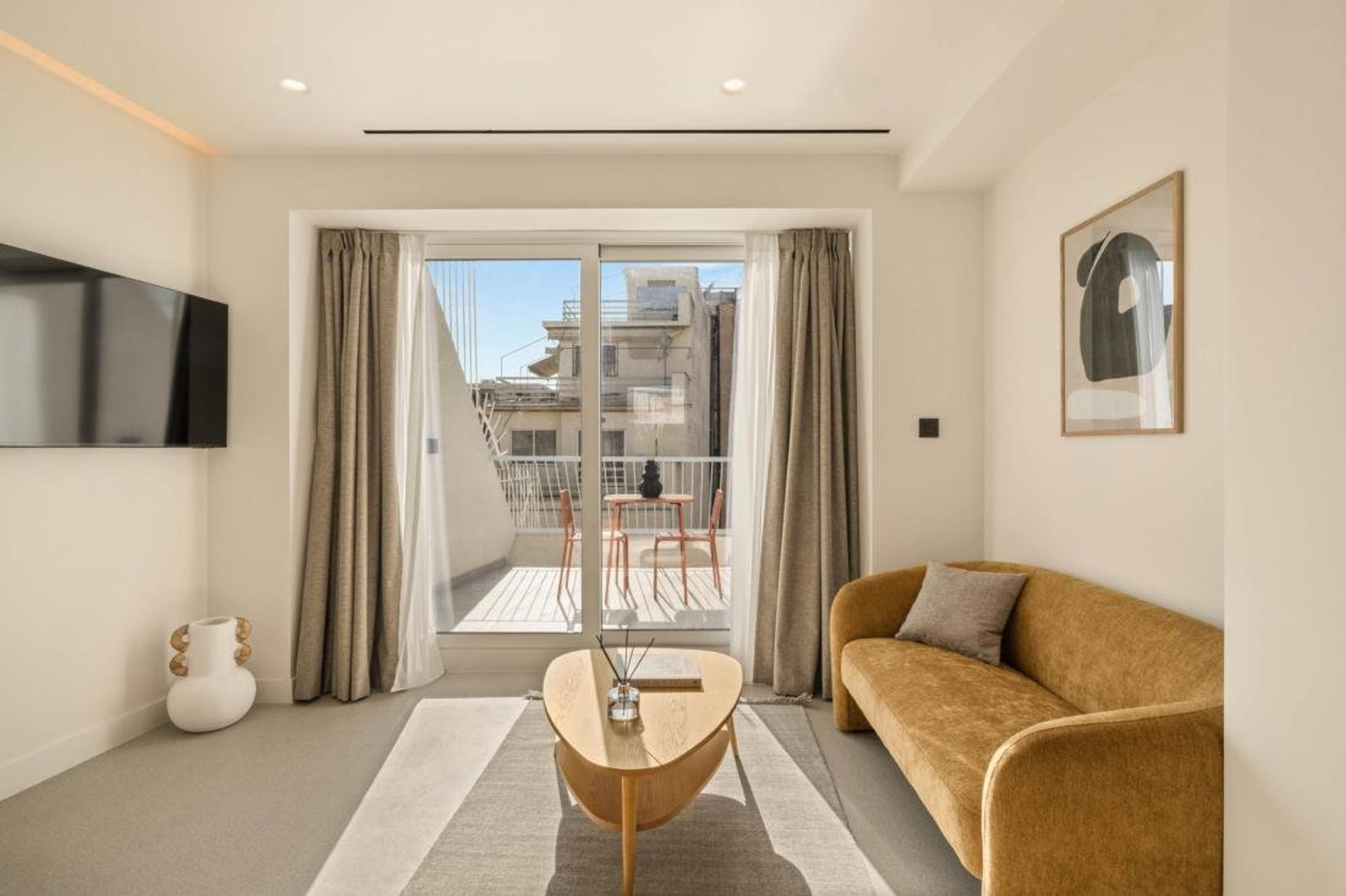 Living room with balcony views