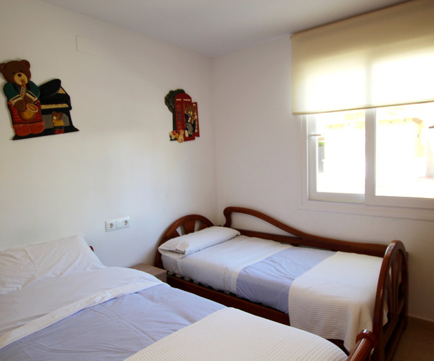 Twin bedroom with cute decor