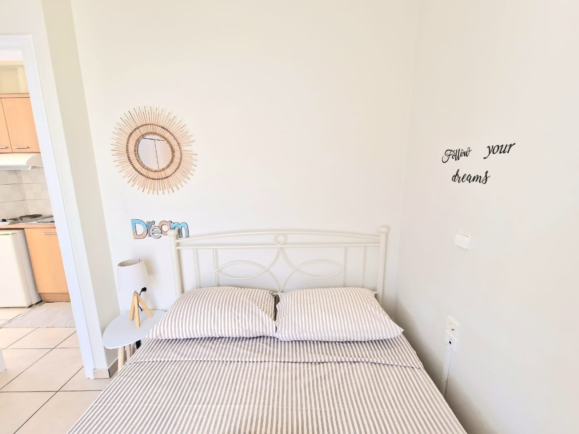 Bright bedroom with double bed.