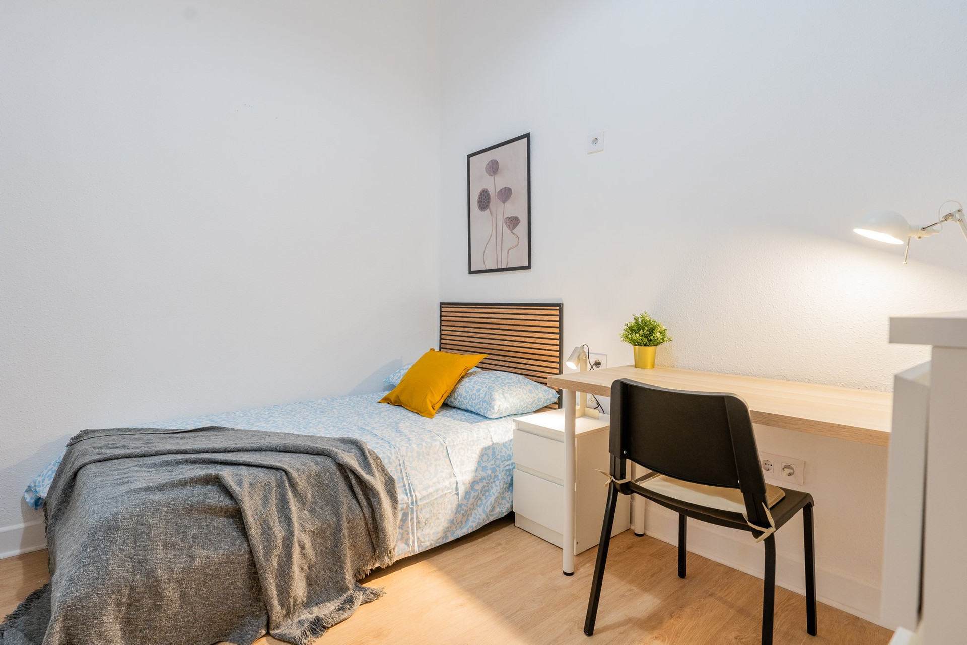 Bedroom with bed and study desk