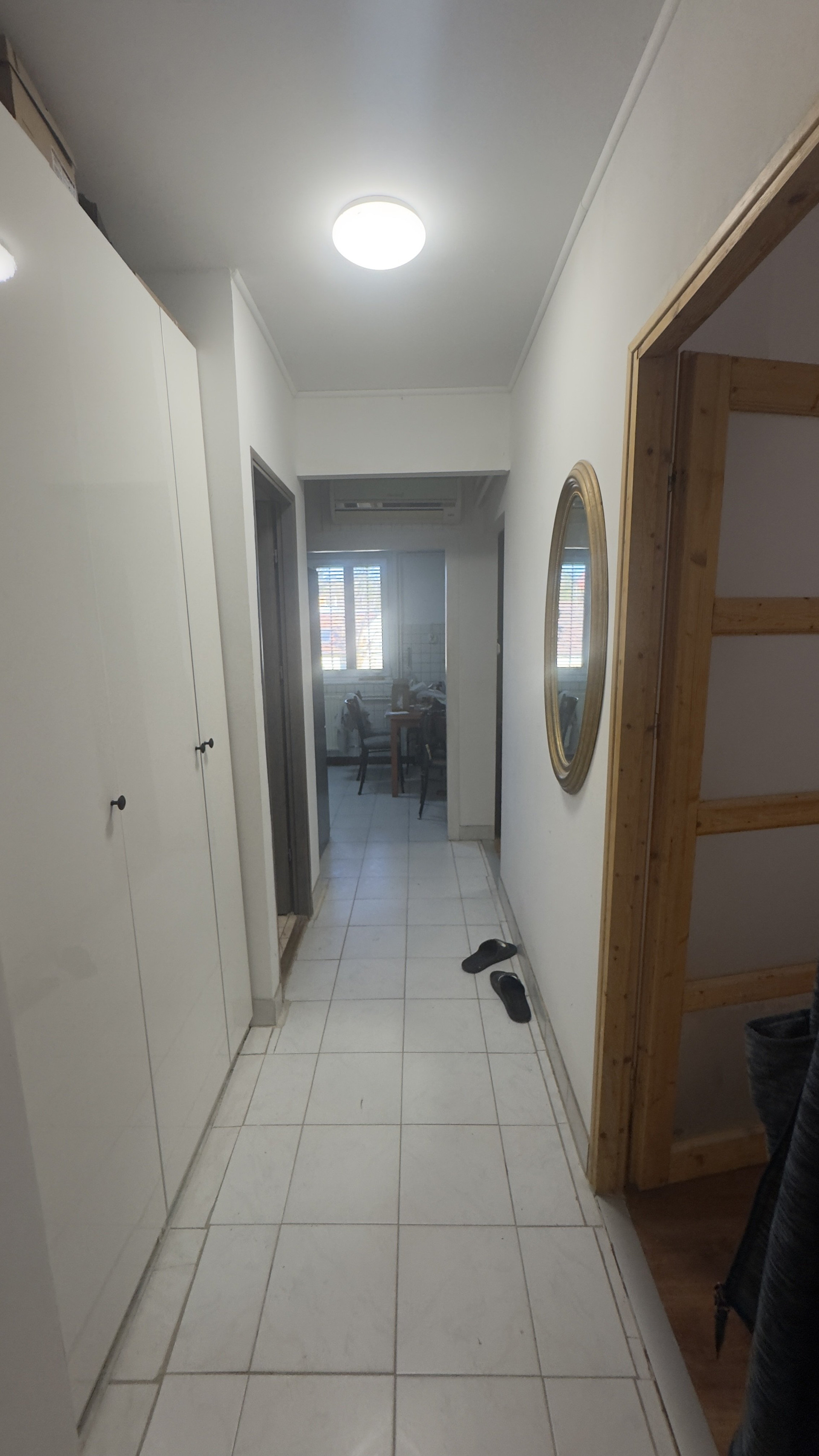 Hallway with wardrobes and mirror