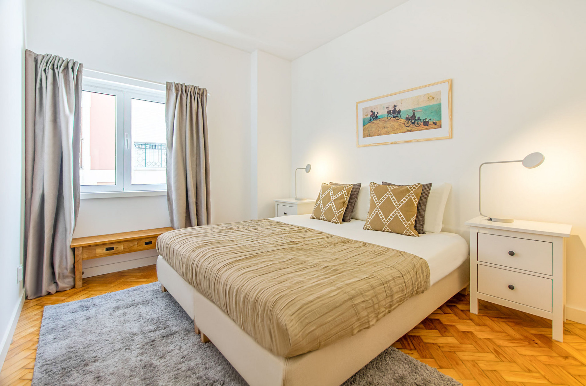 Master bedroom with beige bedding