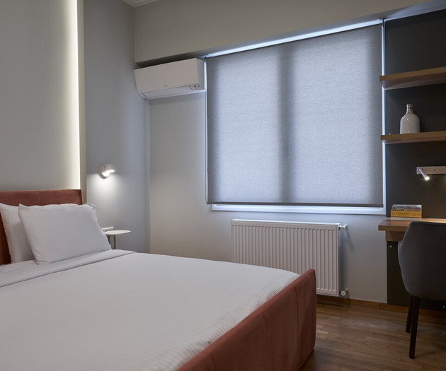 The bedroom and its office desk