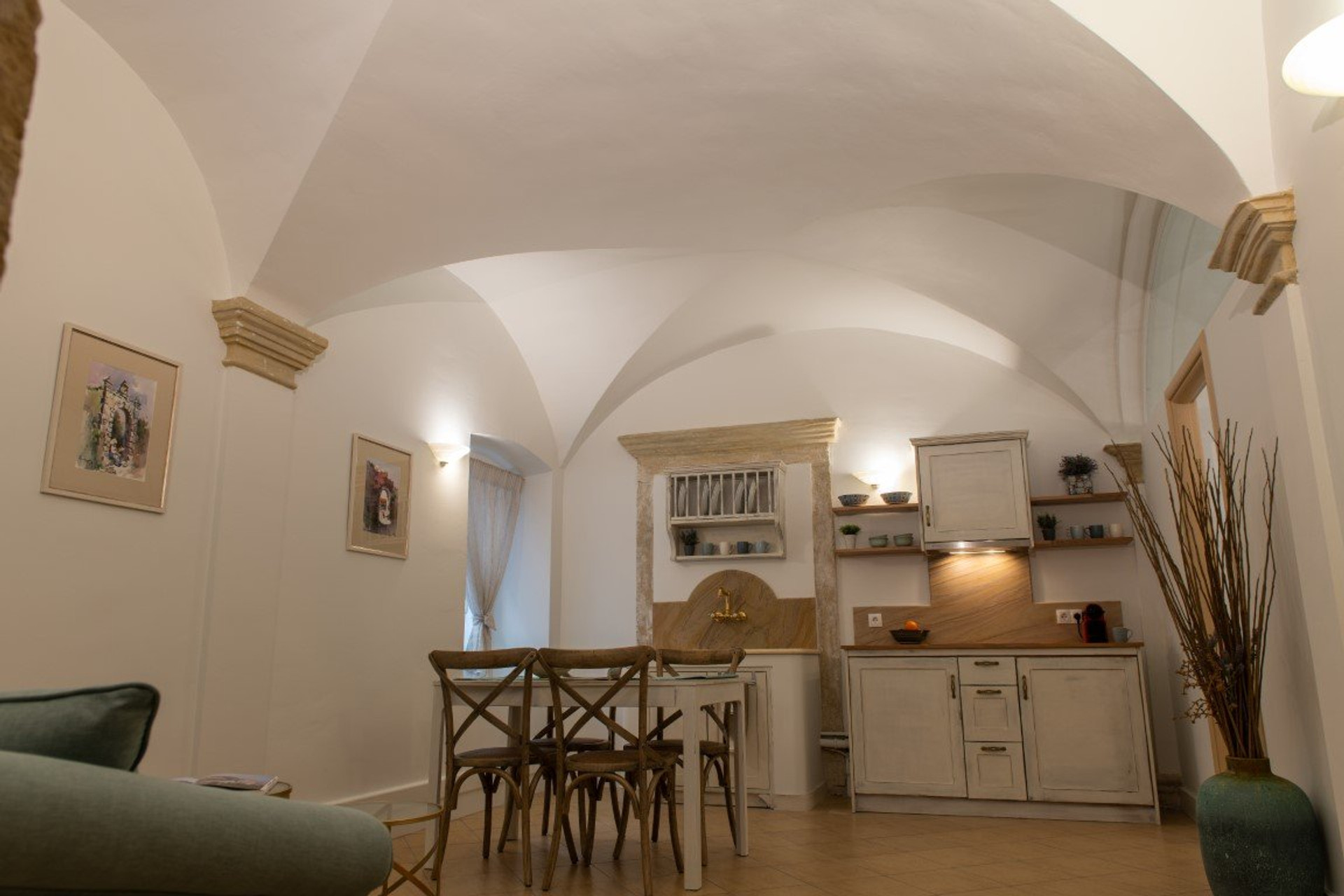 Vaulted living area with kitchenette