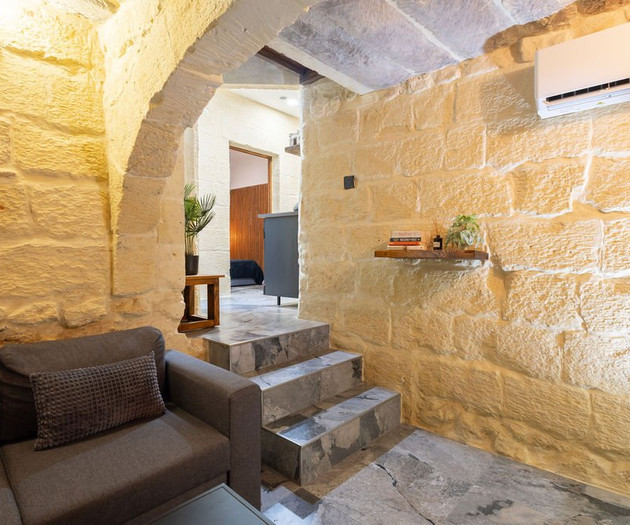 Stairway with stone archway