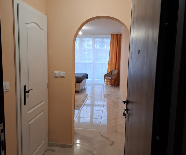 Light studio with balcony close to sea and center